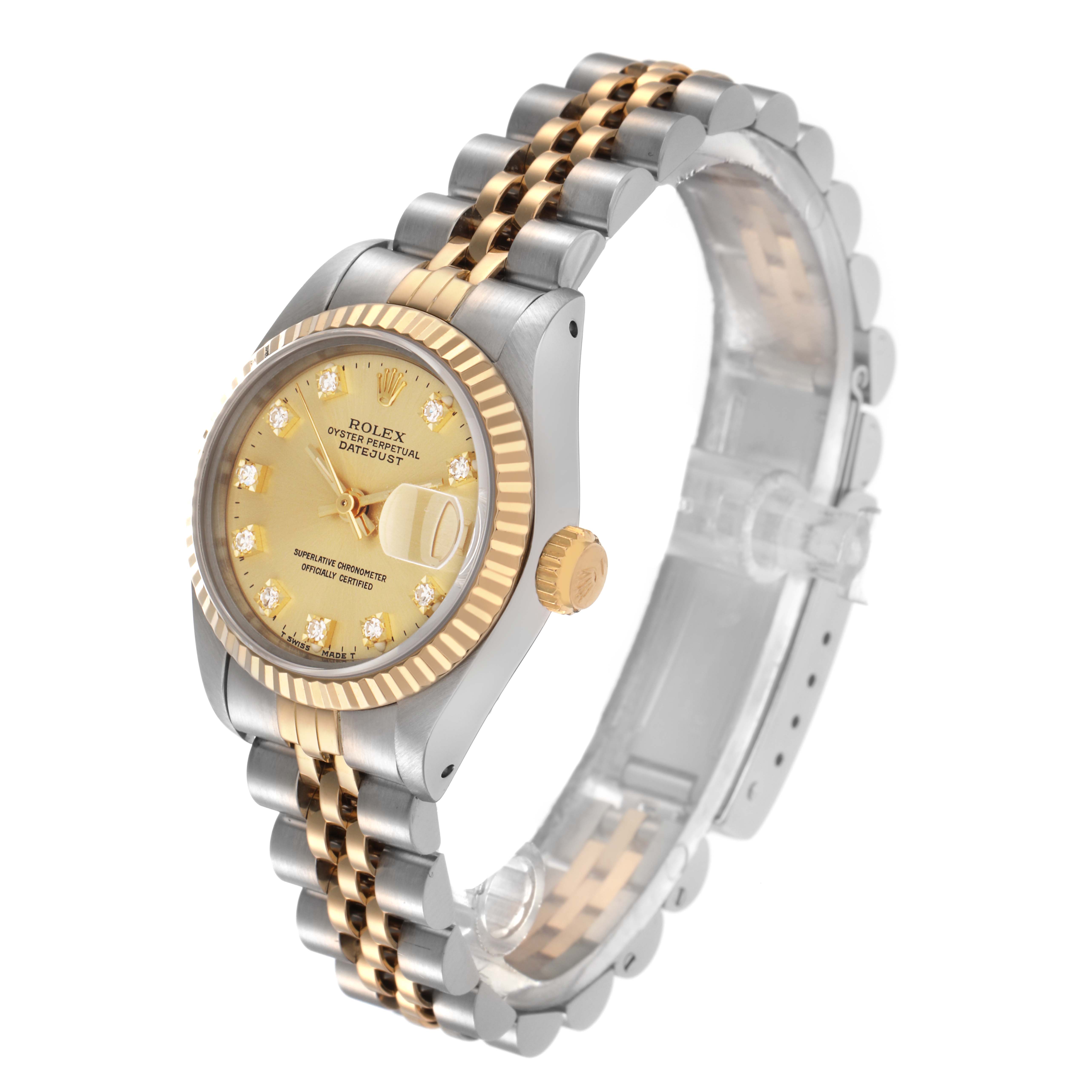 The Rolex Datejust 69173 Women
s Steel and Gold (two tone) Champagne Dial 69173 Women
s Steel and Gold (two tone) Champagne Dial watch is shown at an angled side view, featuring a two-tone bracelet, fluted bezel, and champagne dial with diamond markers.