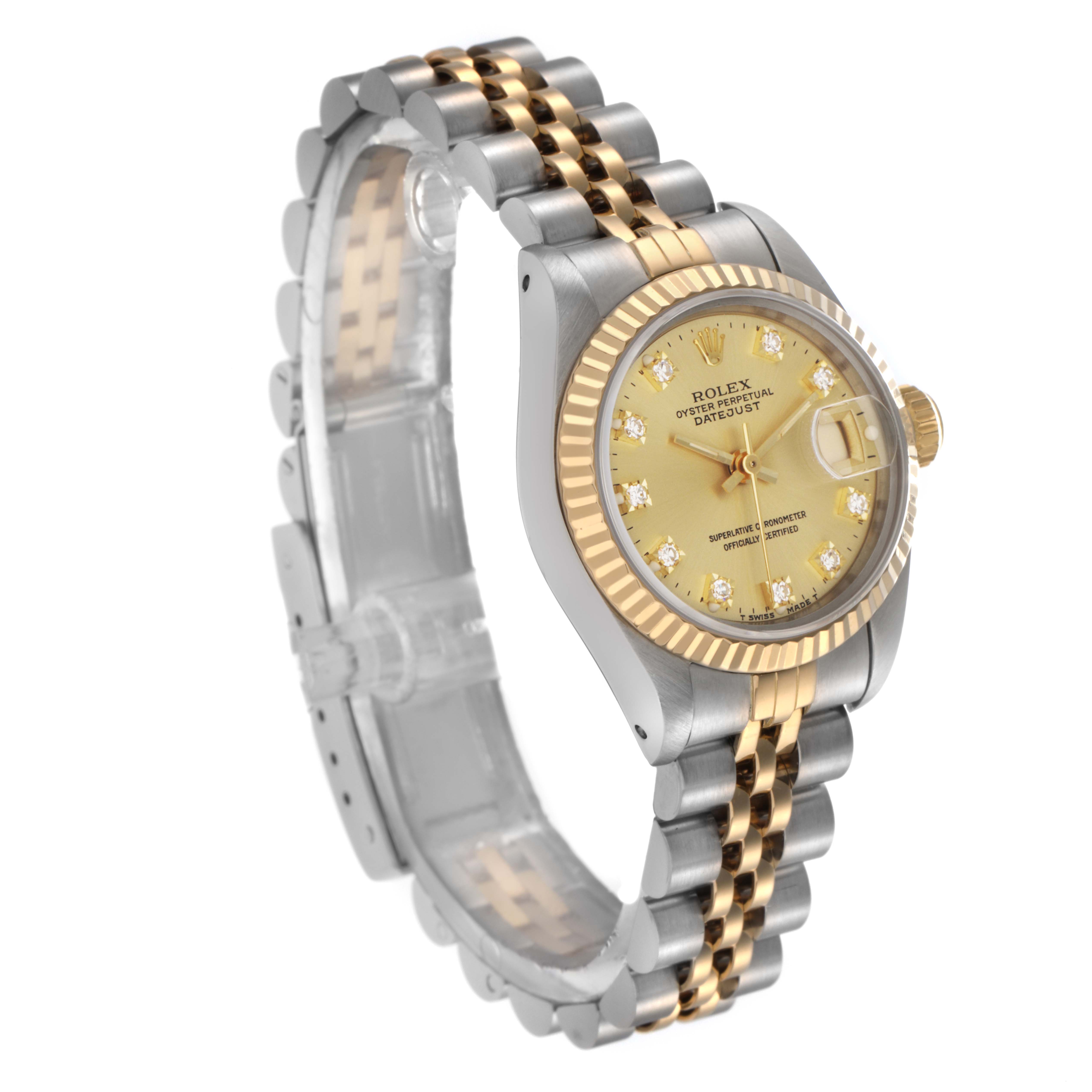 The Rolex Datejust 69173 Women
s Steel and Gold (two tone) Champagne Dial 69173 Women
s Steel and Gold (two tone) Champagne Dial watch is shown at an angle displaying the face, bezel, crown, and part of the jubilee bracelet.
