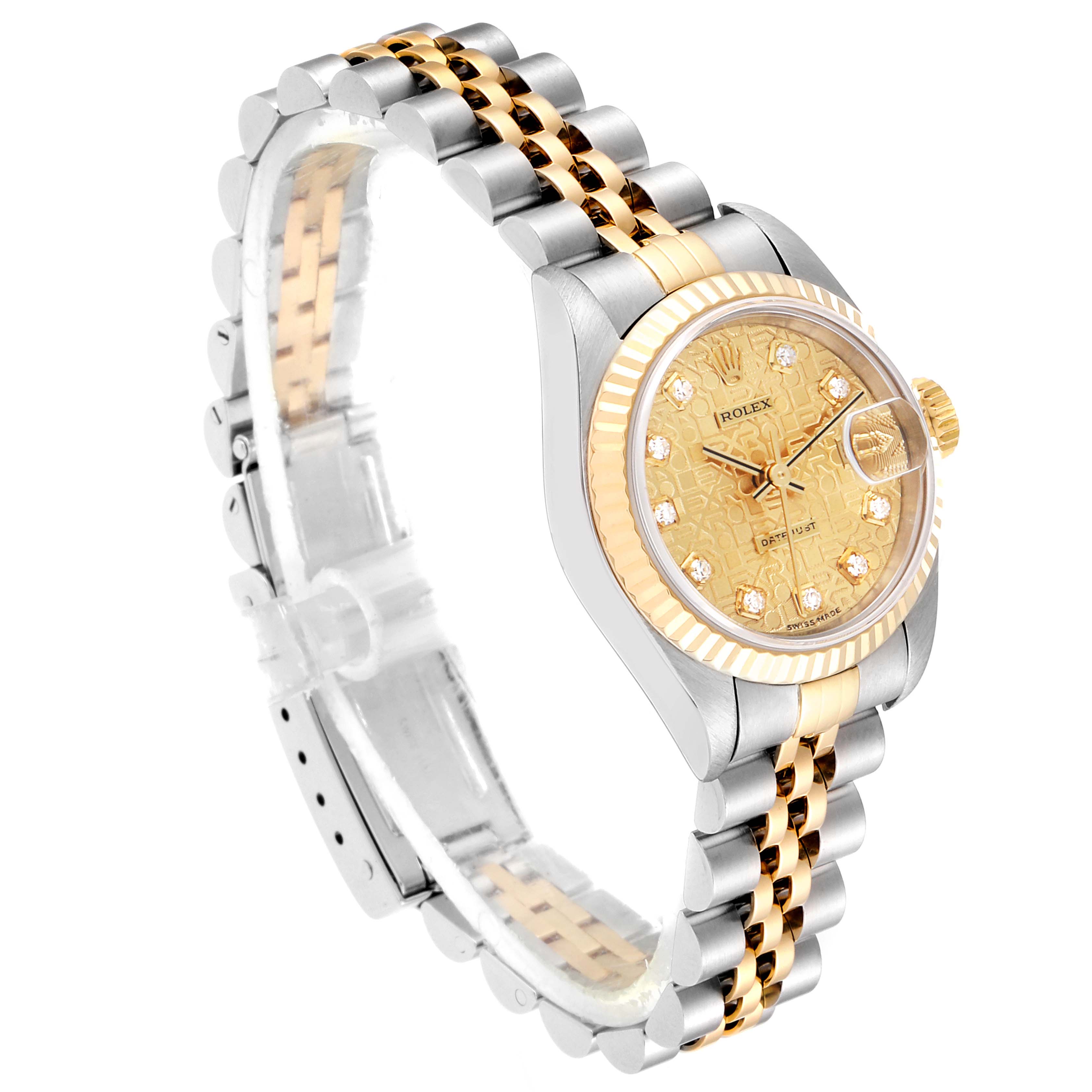 The image shows a Rolex Datejust 79173 Women
s Steel and Gold (two tone) Champagne Dial 79173 Women
s Steel and Gold (two tone) Champagne Dial watch at a slight angle, featuring the dial, bezel, and two-tone bracelet.