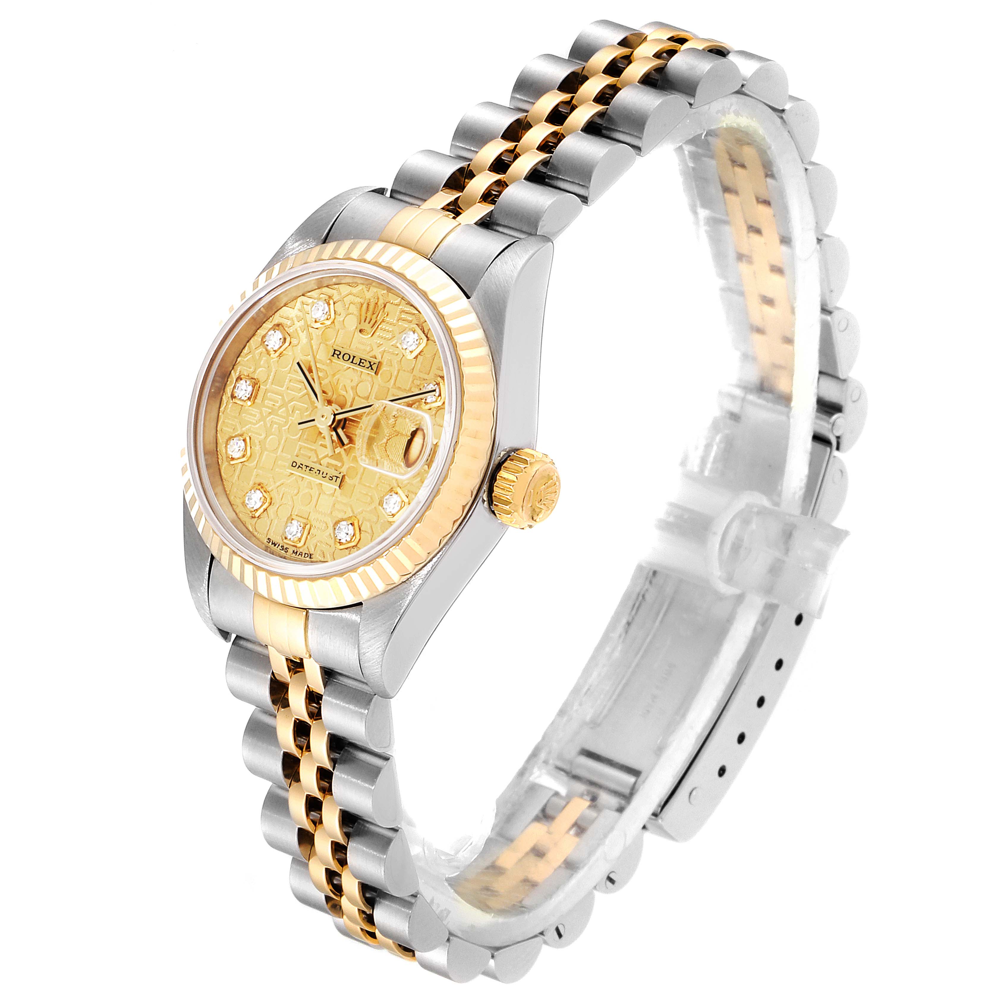The image shows a Rolex Datejust 79173 Women
s Steel and Gold (two tone) Champagne Dial 79173 Women
s Steel and Gold (two tone) Champagne Dial watch angled to display its face, bezel, crown, and two-tone bracelet.