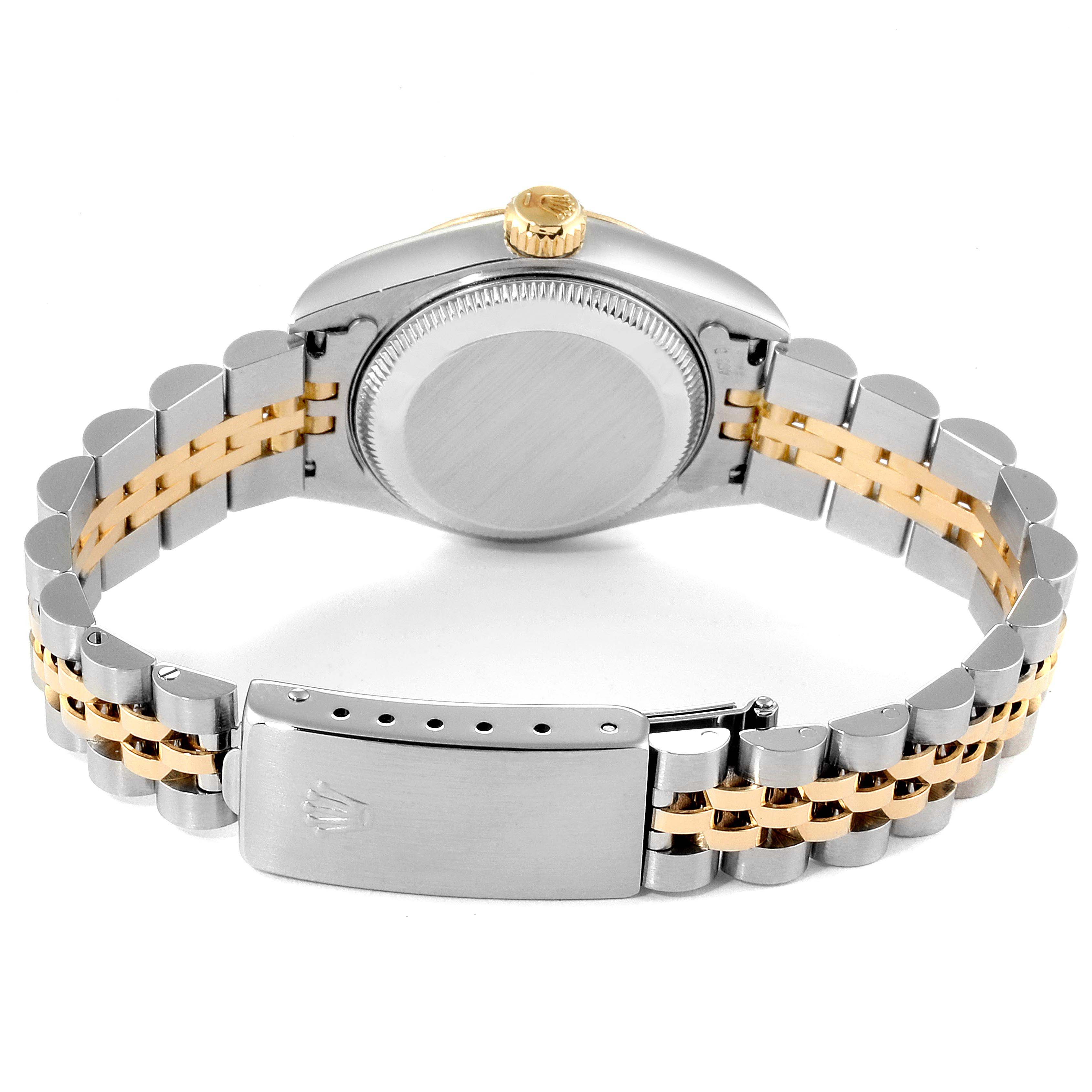 This image displays the back view of a Rolex Datejust 69173 Women's Steel and Gold (two tone) Red Dial 69173 Women's Steel and Gold (two tone) Red Dial watch, highlighting its clasp, bracelet, and case back.