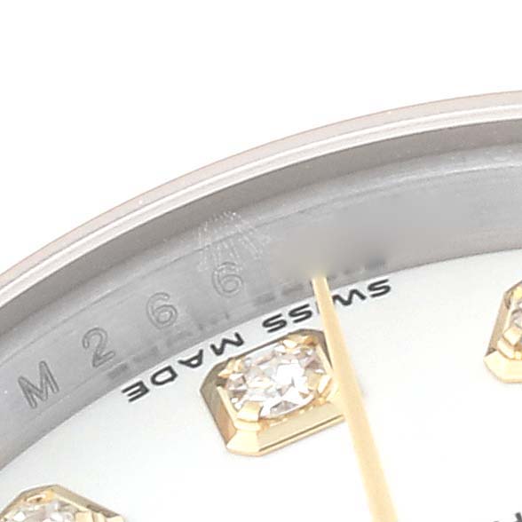 Close-up of the dial, focusing on diamond hour markers and "Swiss Made" text on the Rolex Datejust 179173 Women's Steel and Gold (two tone) White Dial 179173 Women's Steel and Gold (two tone) White Dial watch.