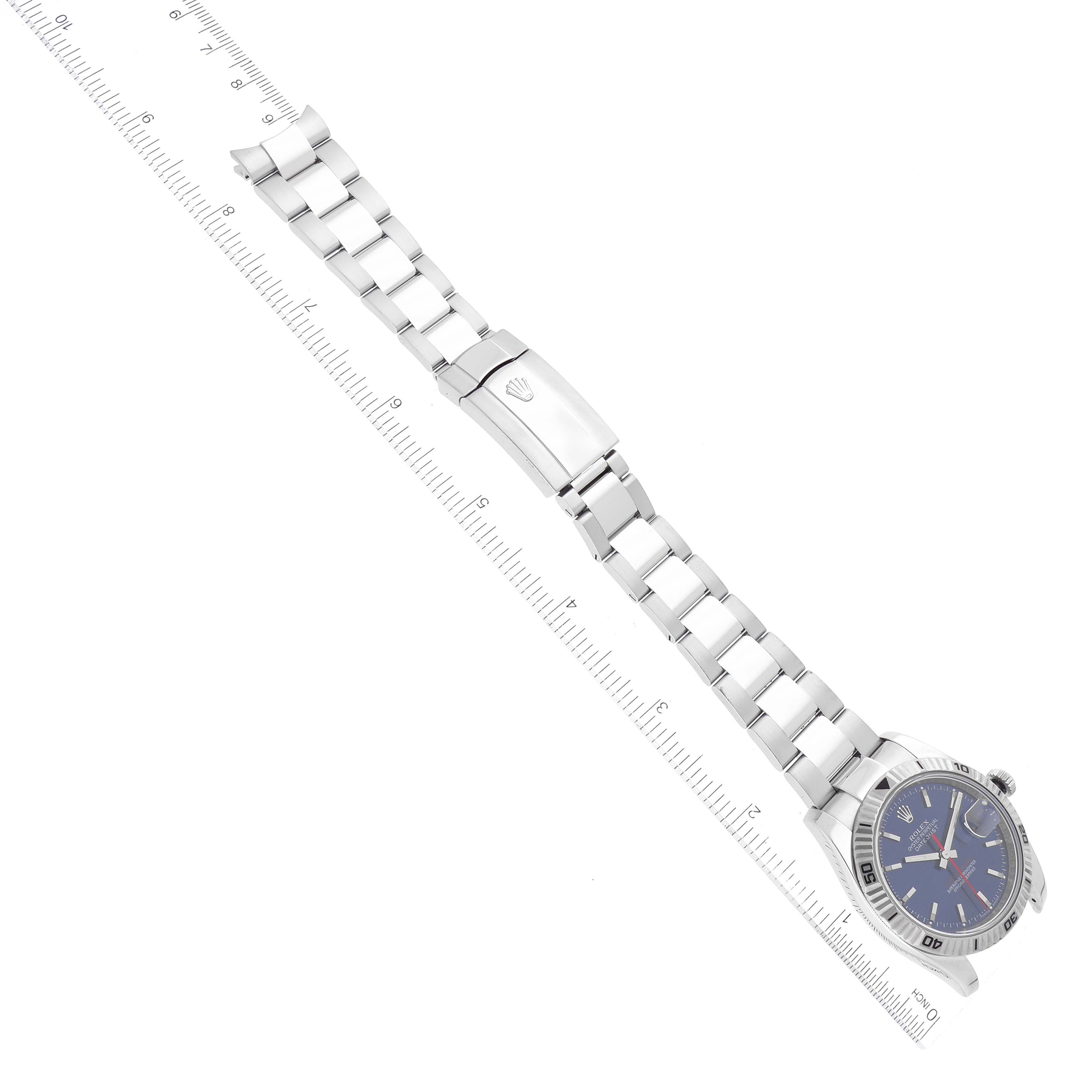 The image shows a Rolex Turn-o-Graph 116264 Men
s Stainless Steel Blue Dial 116264 Men
s Stainless Steel Blue Dial watch laid flat, displaying the face, bracelet, and clasp at an aerial angle.