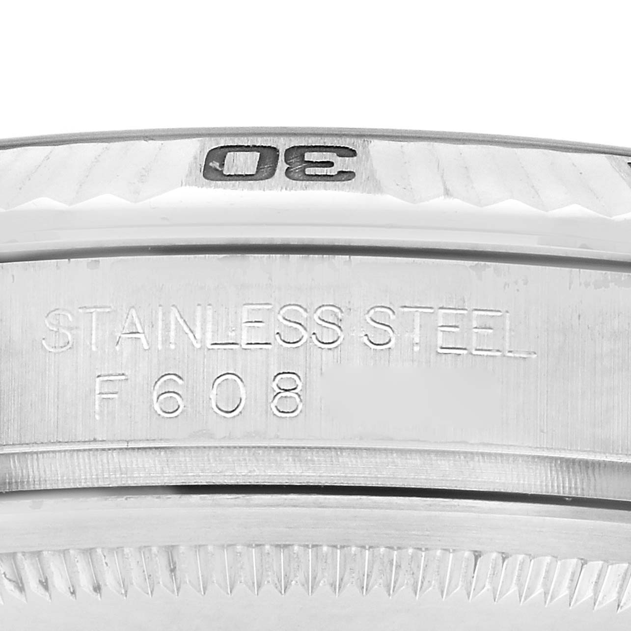 The image shows a close-up of the bezel and side case of a Rolex Turn-o-Graph 116264 Men
s Stainless Steel Blue Dial 116264 Men
s Stainless Steel Blue Dial watch, highlighting its stainless steel material.