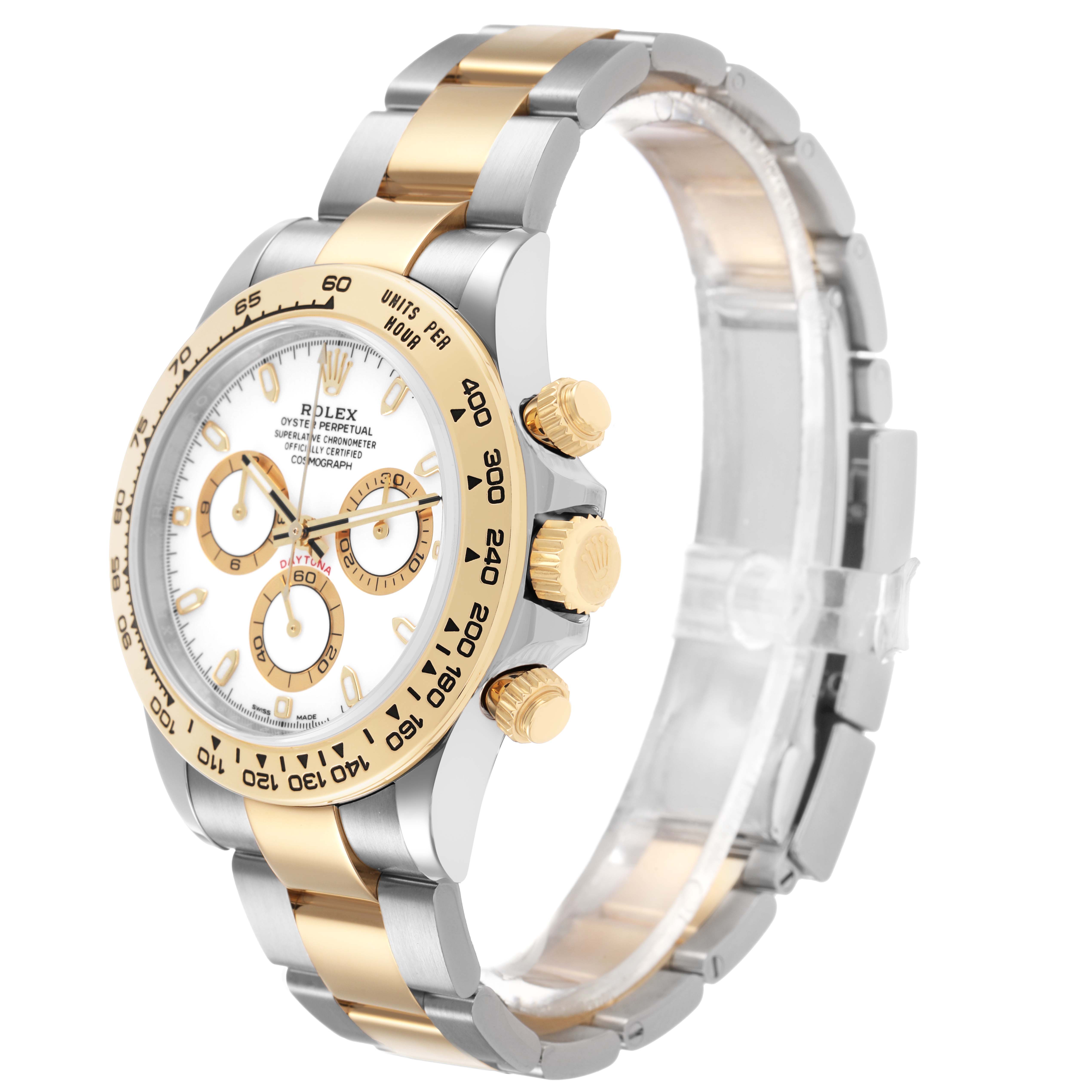 The Rolex Daytona 116503 Men's Steel and Gold (two tone) White Dial watch is shown at an angle displaying the face, bezel, crown, and part of the two-tone bracelet.