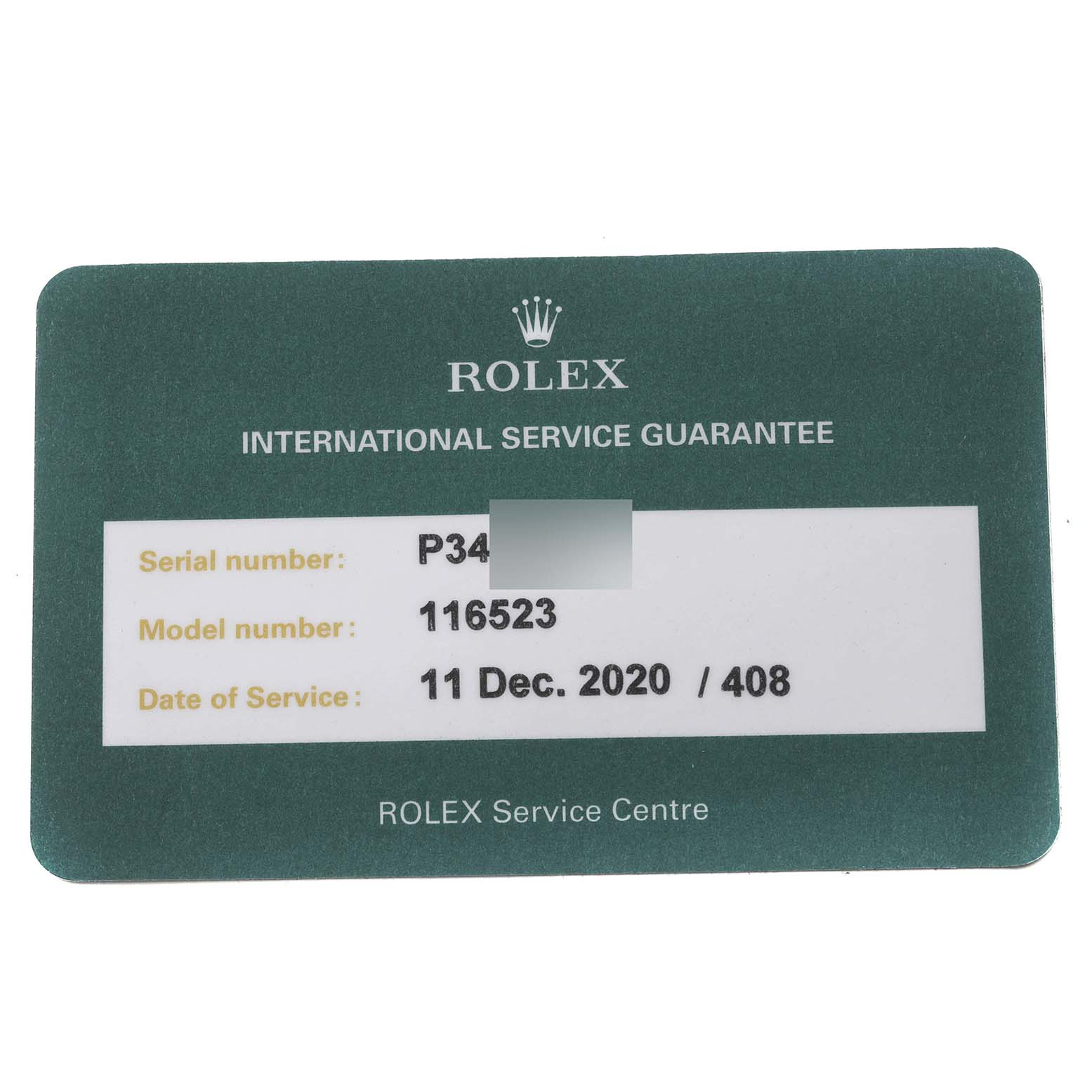The image shows a Rolex Service Guarantee card for the Rolex Daytona 116523 Men
s Steel and Gold (two tone) White Dial 116523 Men
s Steel and Gold (two tone) White Dial model number 116523.