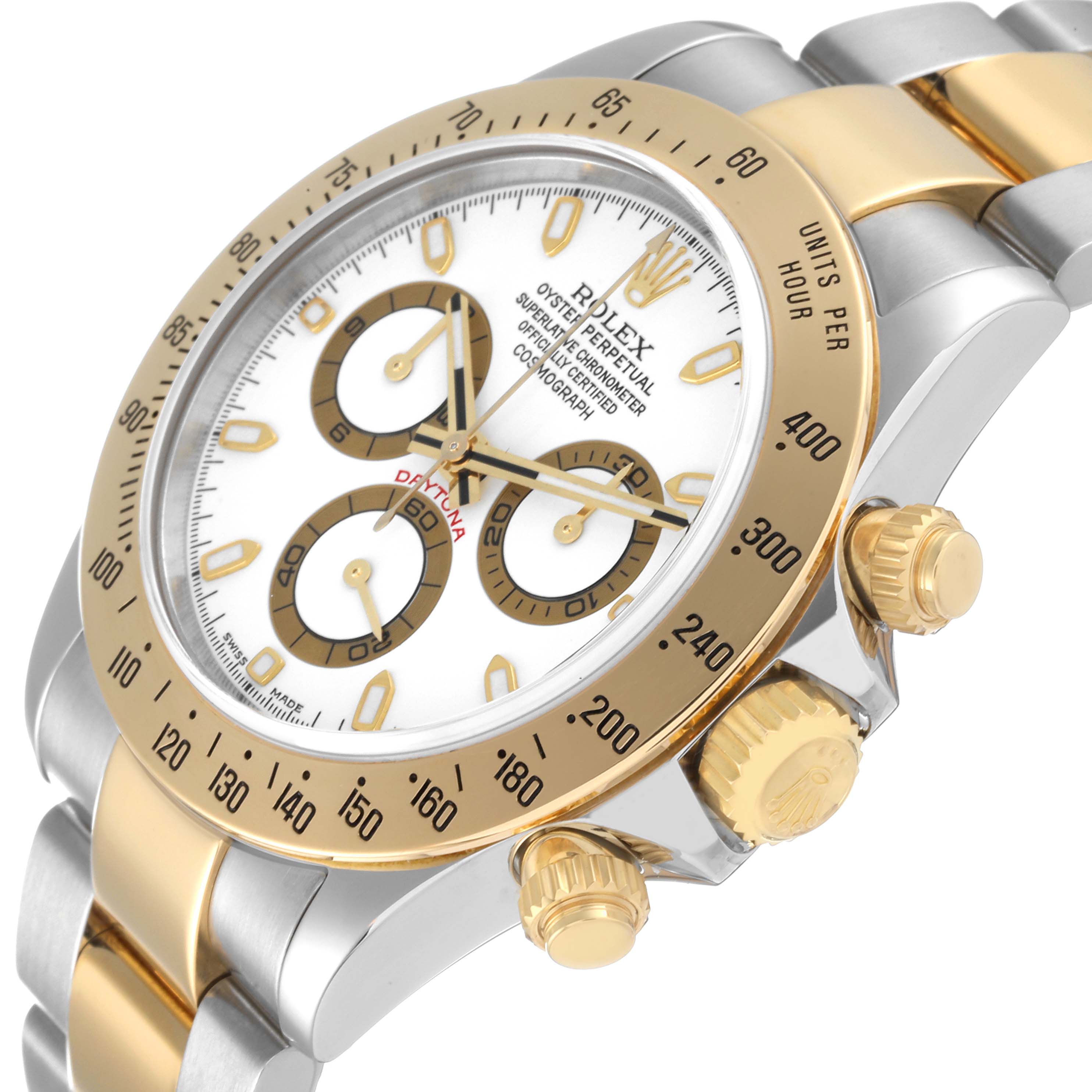 The image shows a close-up angle of the Rolex Daytona 116523 Men
s Steel and Gold (two tone) White Dial 116523 Men
s Steel and Gold (two tone) White Dial watch, highlighting its face, bezel, and chronograph pushers.
