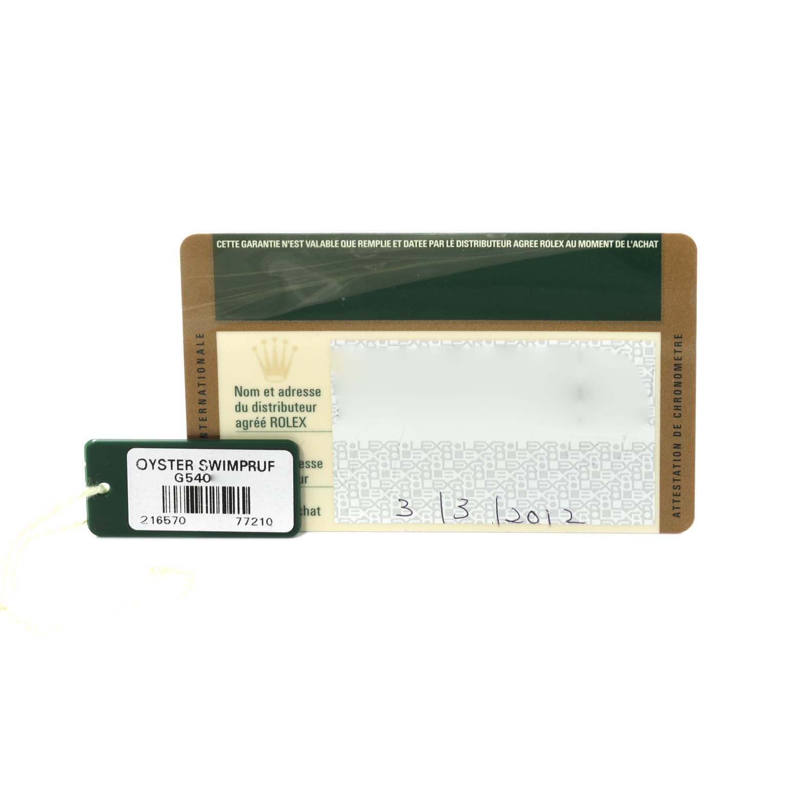The image shows the warranty card and tag for a Rolex Explorer 216570 Men's Stainless Steel Black Dial 216570 Men's Stainless Steel Black Dial watch, displaying model and serial numbers.