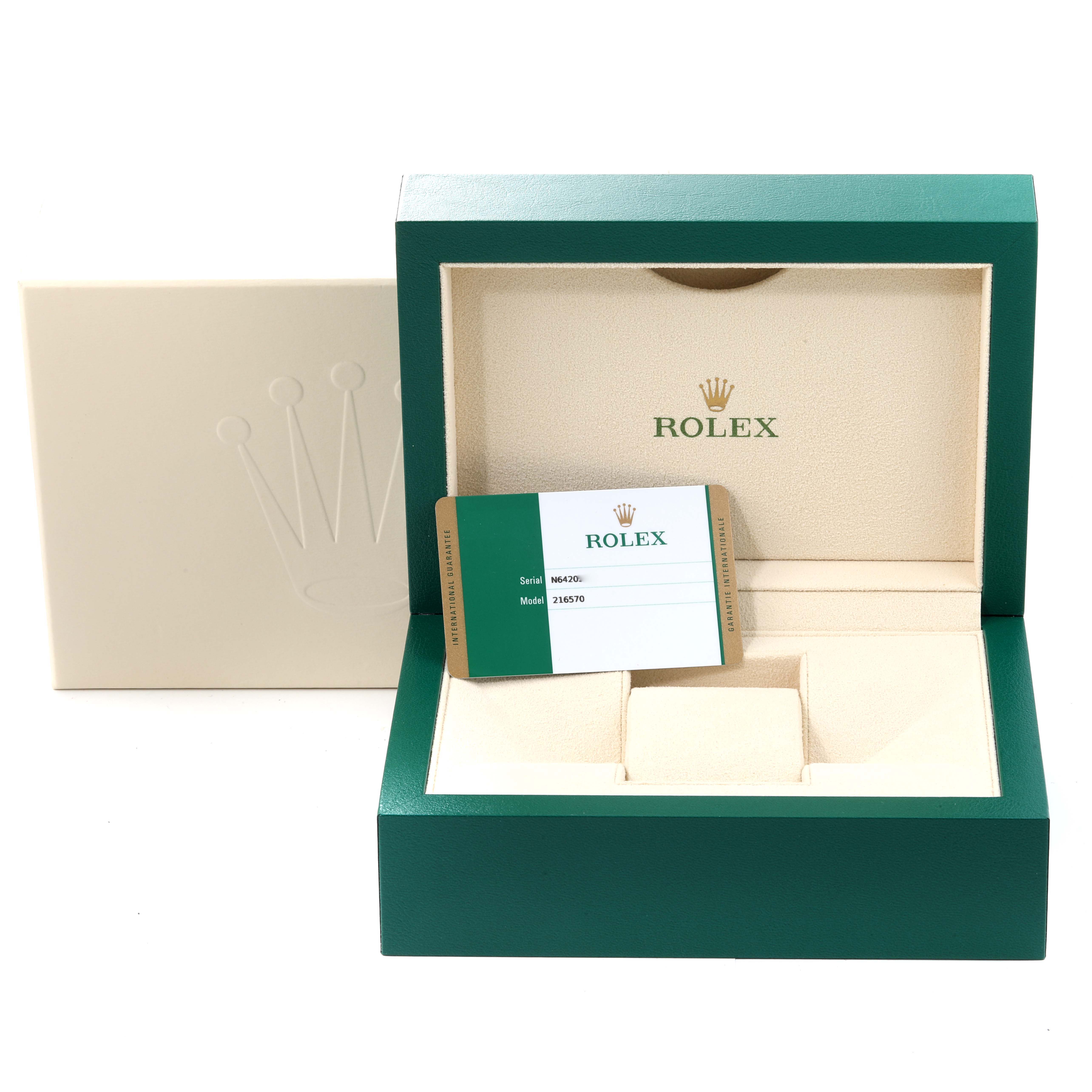 A Rolex Explorer 216570 Men
s Stainless Steel White Dial 216570 Men
s Stainless Steel White Dial watch box, opened to reveal the inner padding and Best Quality
ity card, displayed at a frontal angle.