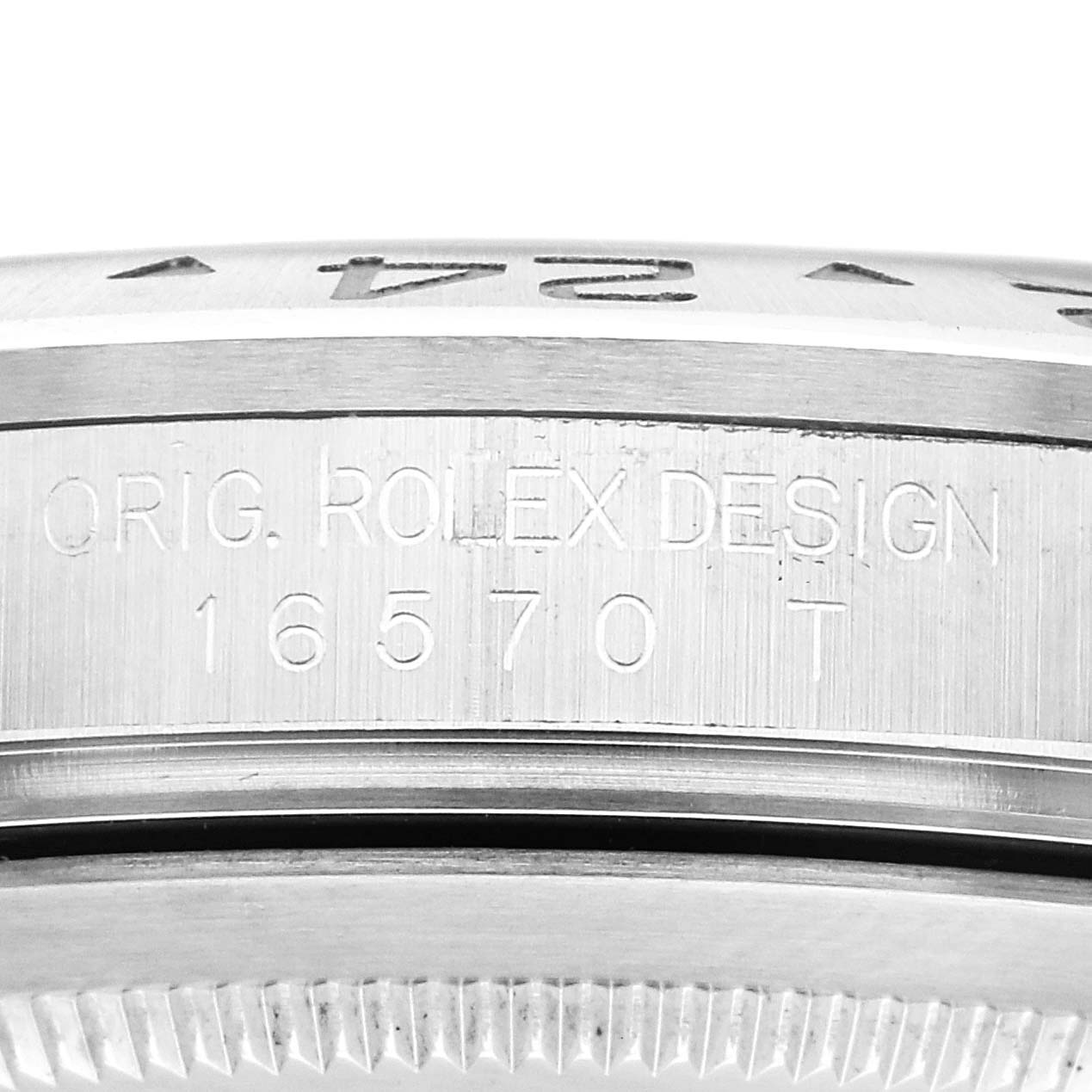 The image shows a close-up of the case side of a Rolex Explorer 16570 Men
s Stainless Steel White Dial 16570 Men
s Stainless Steel White Dial, featuring the model number 16570 engraved.