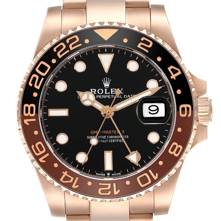 The Rolex GMT-Master II watch is shown from a top-down angle, displaying its bezel, face, and part of the bracelet.