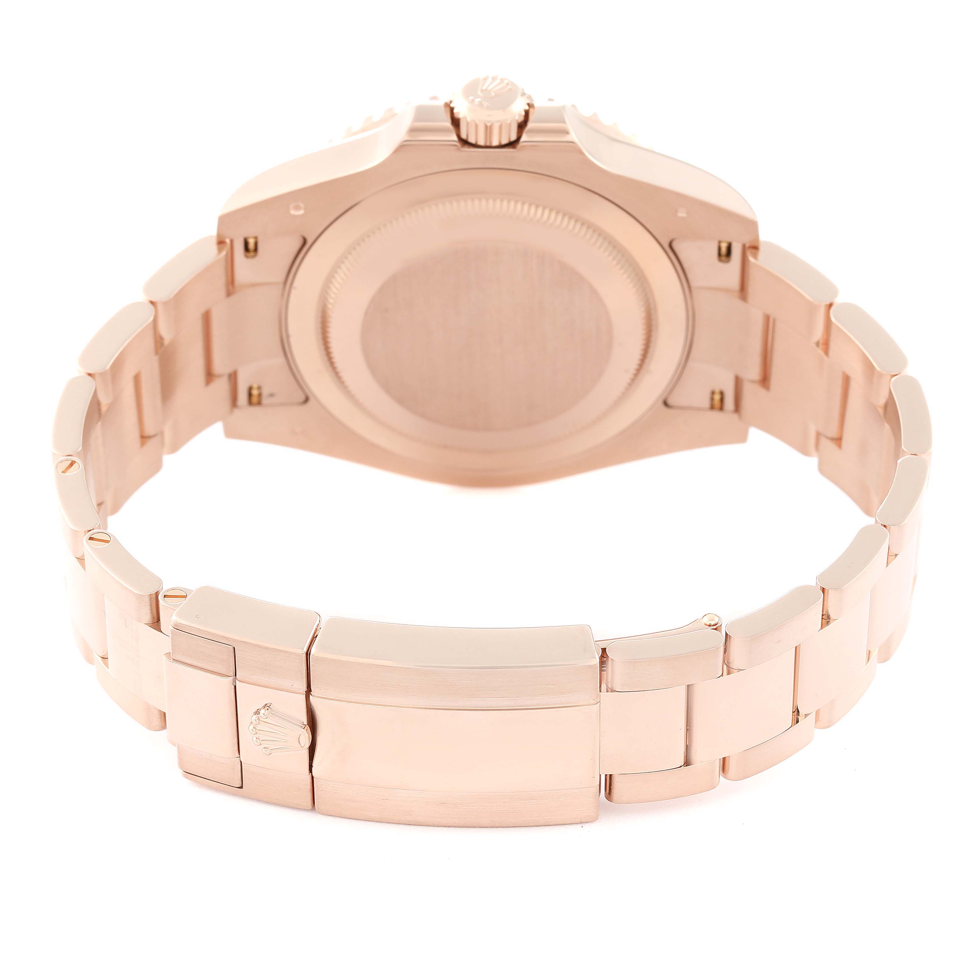 The image shows the back case and bracelet clasp of a Rolex GMT-Master 126715CHNR Men's Rose Gold Black Dial 126715CHNR Men's Rose Gold Black Dial watch in a rose gold finish.