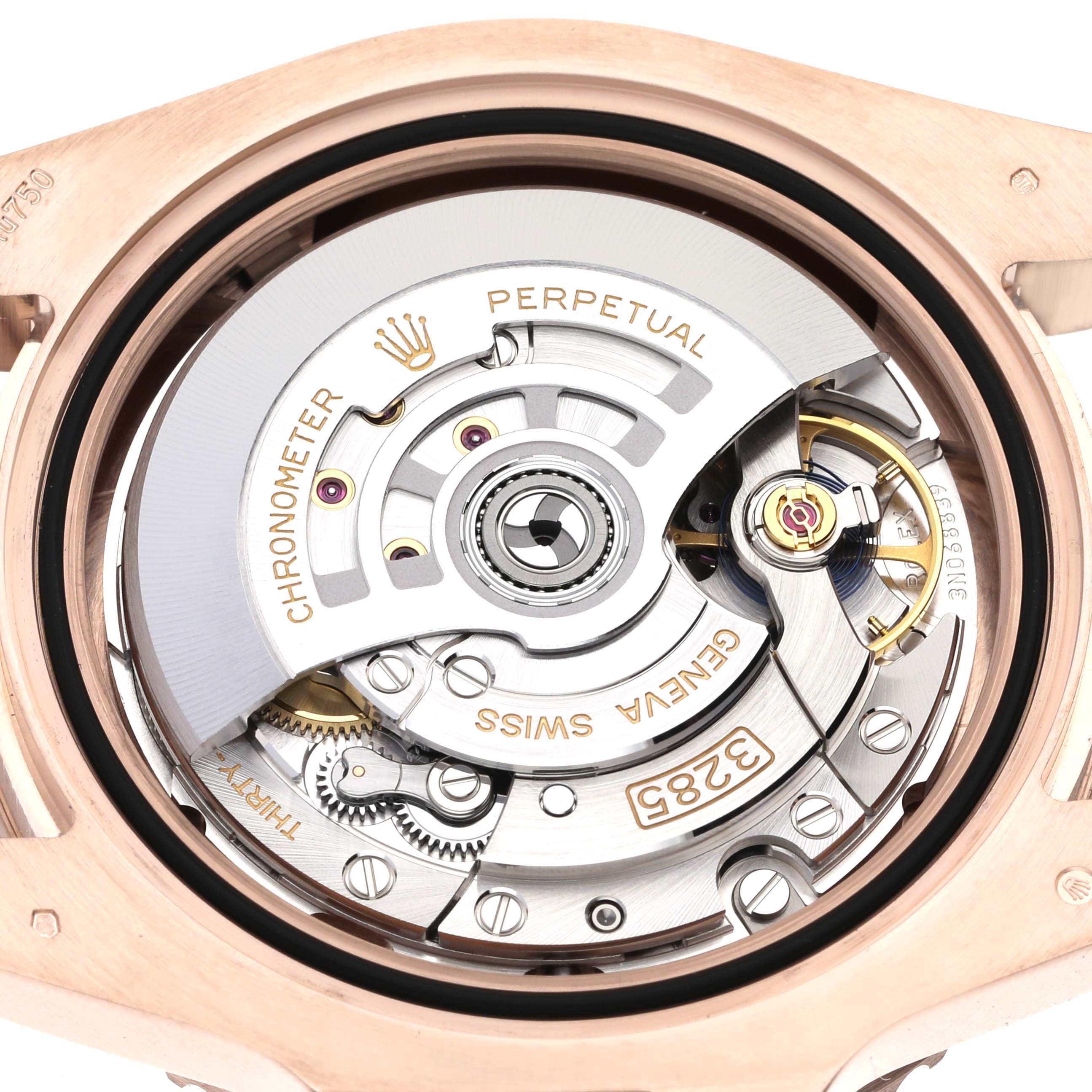 The image shows the movement mechanism of a Rolex GMT-Master 126715CHNR Men's Rose Gold Black Dial 126715CHNR Men's Rose Gold Black Dial watch viewed from the case back.