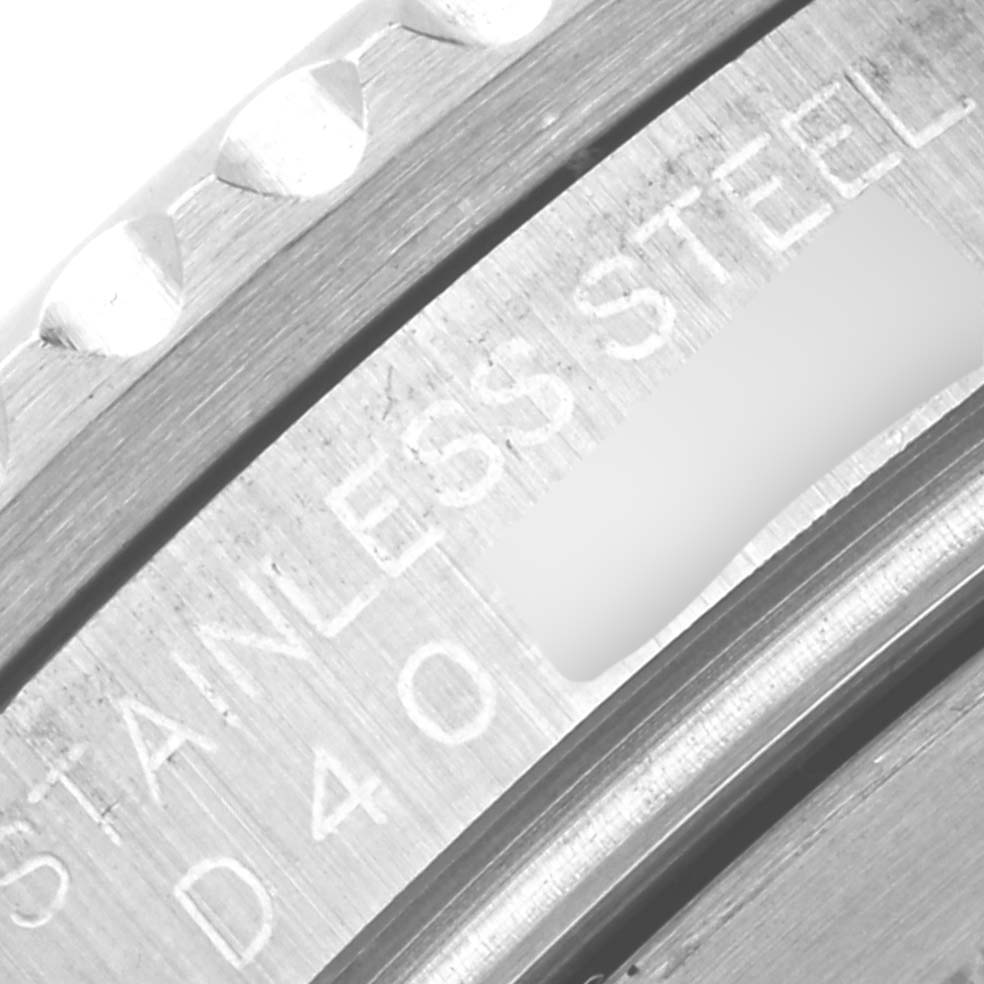The image shows a close-up angle of the stainless steel and part of the bezel of a Rolex GMT-Master 16710 Men
s Stainless Steel Black Dial 16710 Men
s Stainless Steel Black Dial watch.