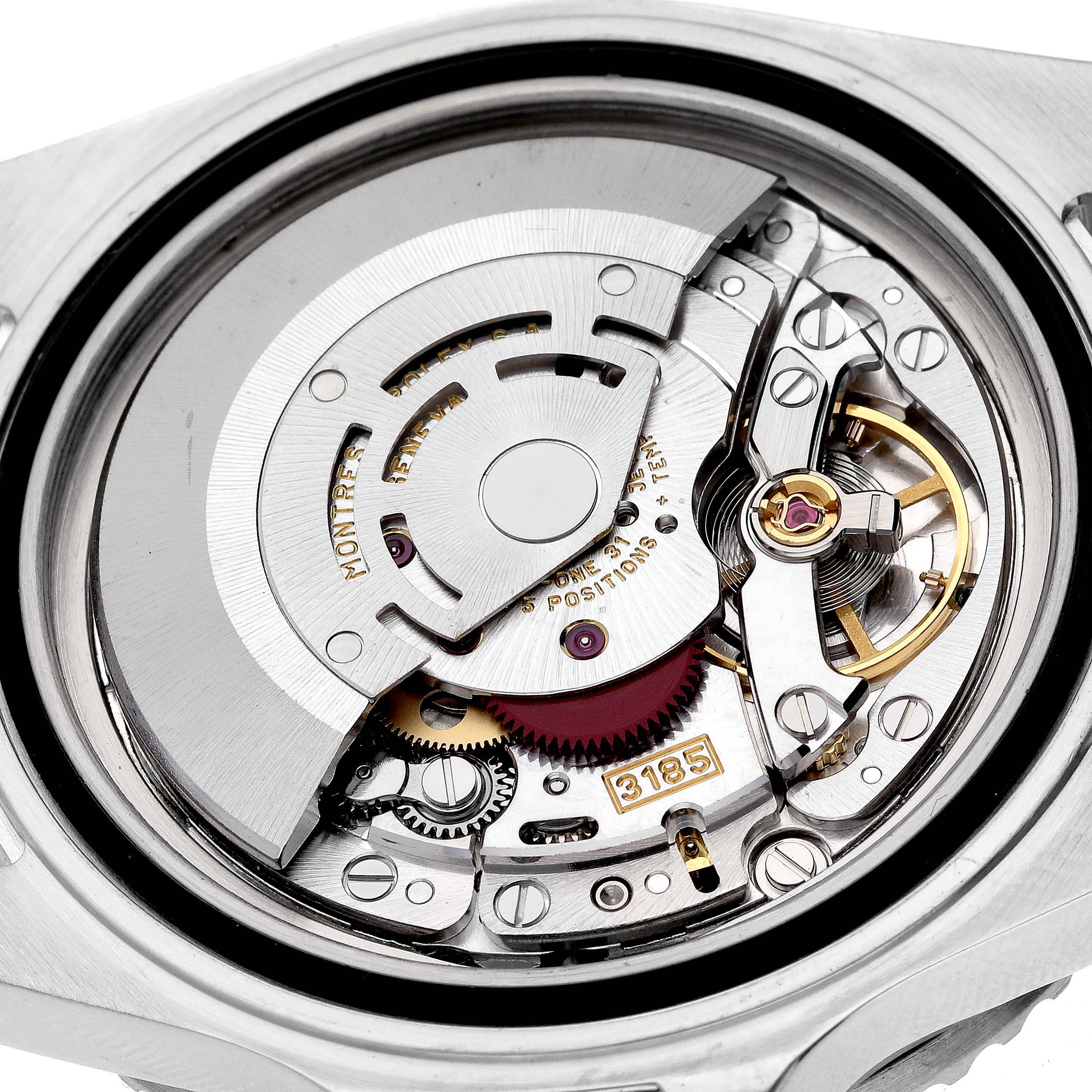 This image shows the inner movement mechanism of a Rolex GMT-Master 16710 Men
s Stainless Steel Black Dial 16710 Men
s Stainless Steel Black Dial watch in close-up detail.