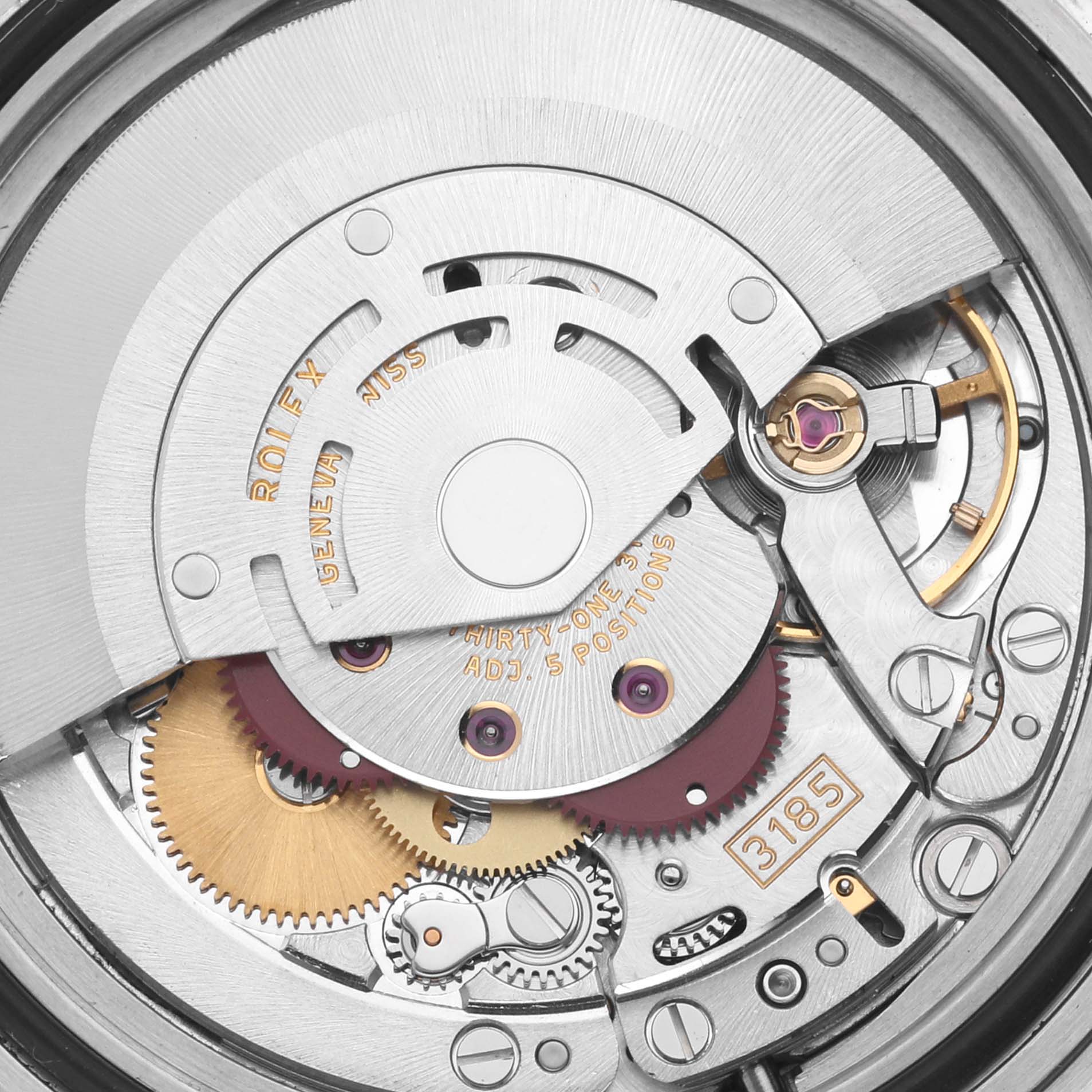 The image shows a detailed view of the movement mechanism of a Rolex GMT-Master 16710 Men
s Stainless Steel Black Dial 16710 Men
s Stainless Steel Black Dial, including gears and the rotor.