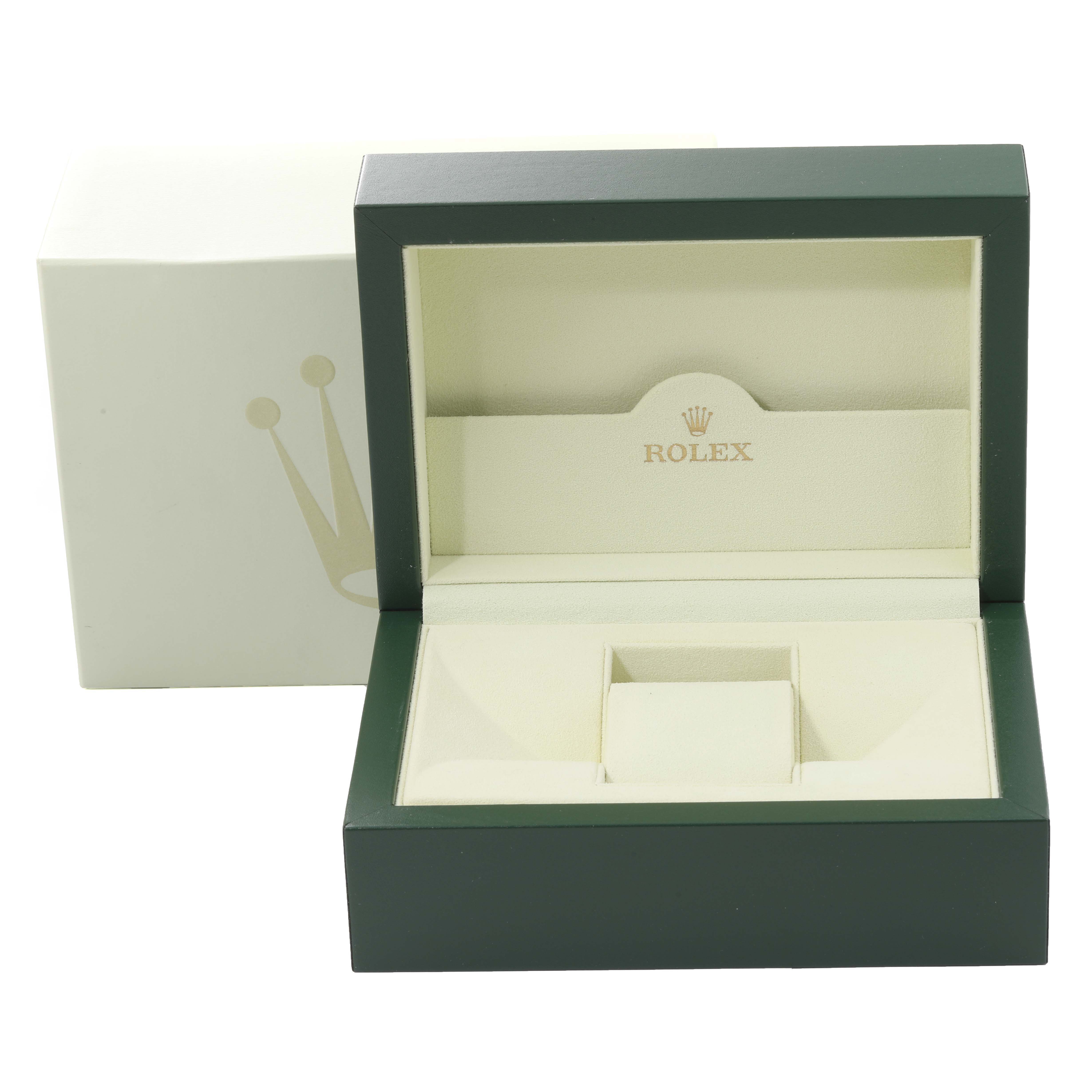 The image shows an open green and beige Rolex box for the GMT-Master model, viewed from the front and slightly above.