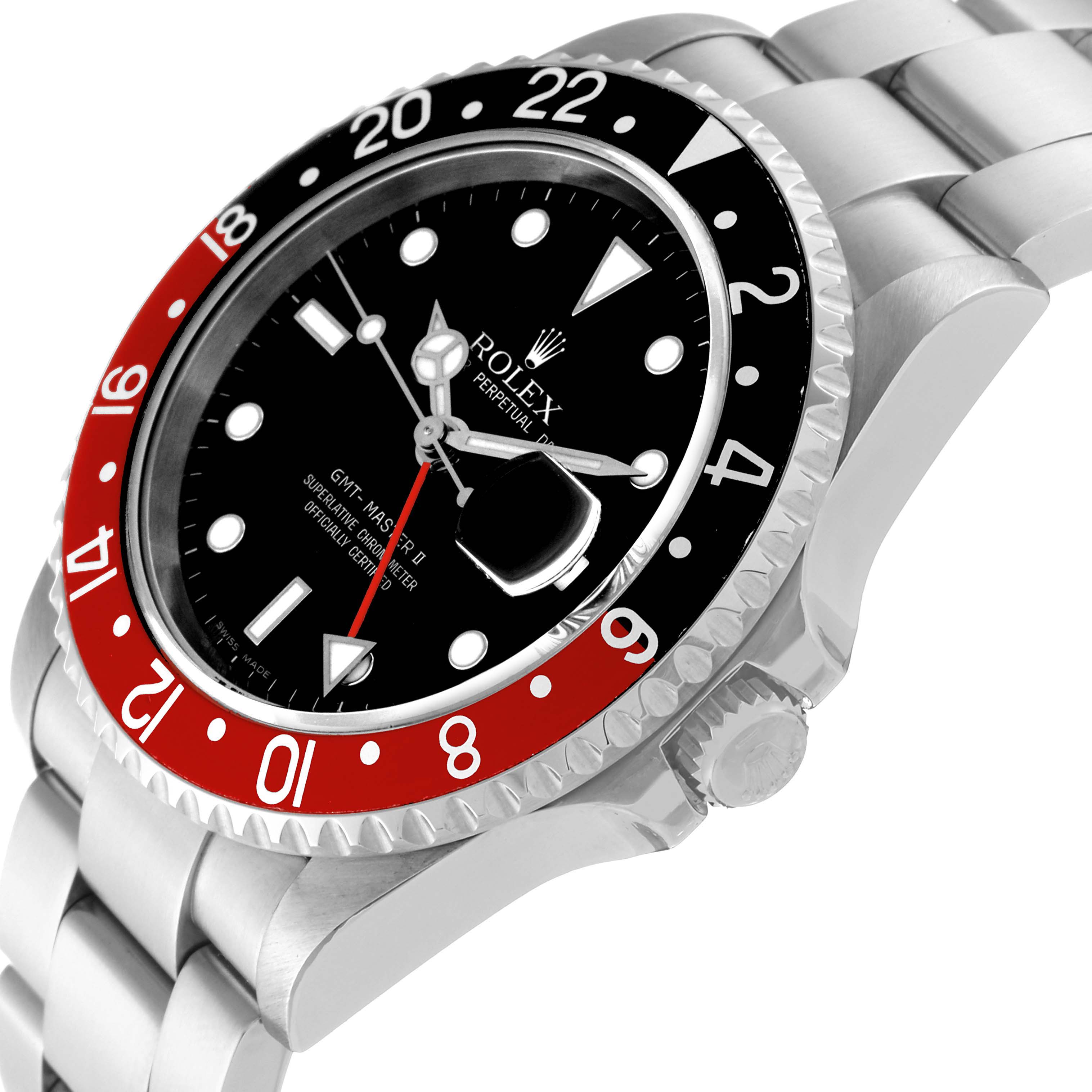 The image shows a close-up view of the Rolex GMT-Master 16710 Men
s Stainless Steel Black Dial 16710 Men
s Stainless Steel Black Dial watch dial, bezel, and part of the bracelet from a slight angle.