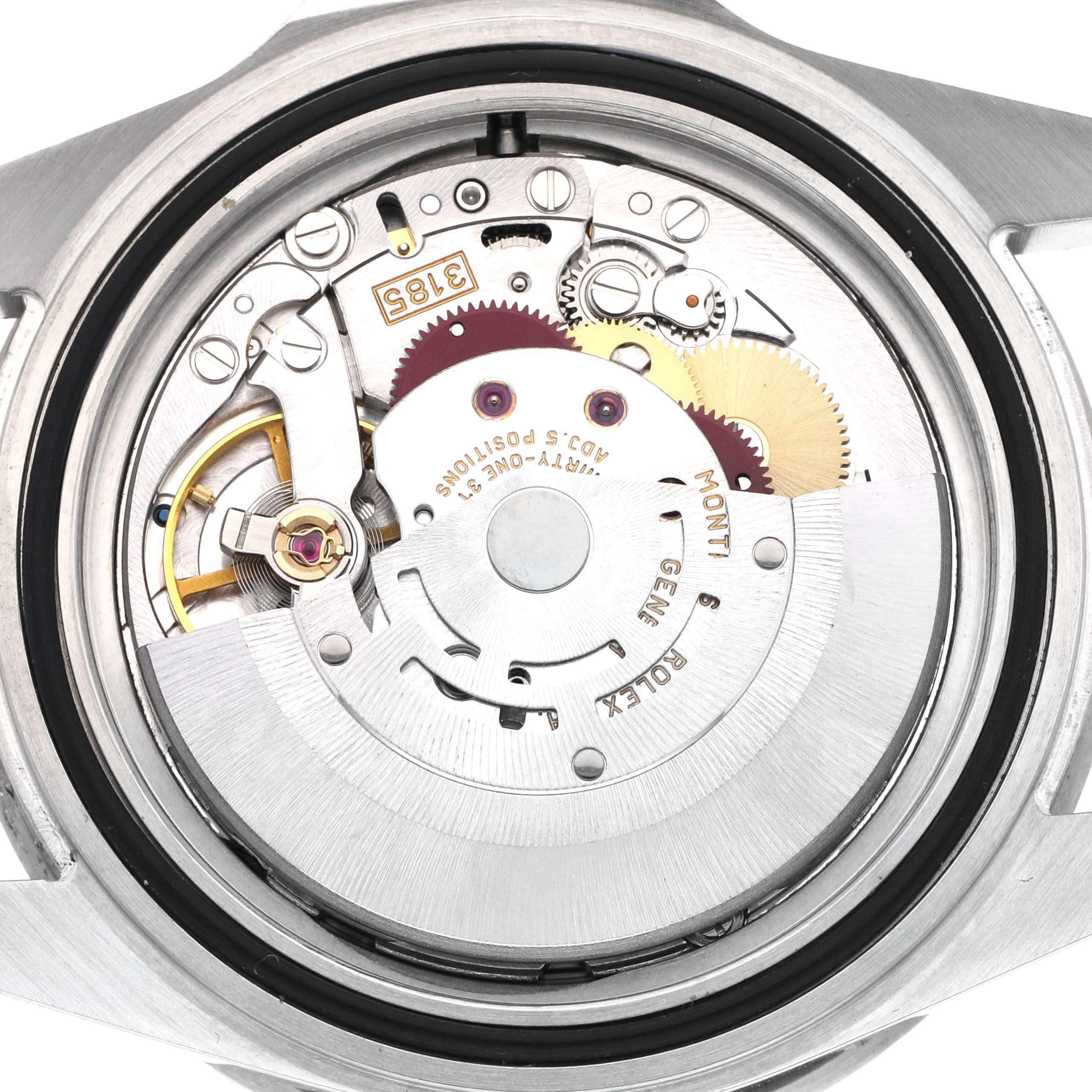 The image shows the inner mechanical movement of a Rolex GMT-Master 16710 Men
s Stainless Steel Black Dial 16710 Men
s Stainless Steel Black Dial, viewed from the back with visible gears and components.