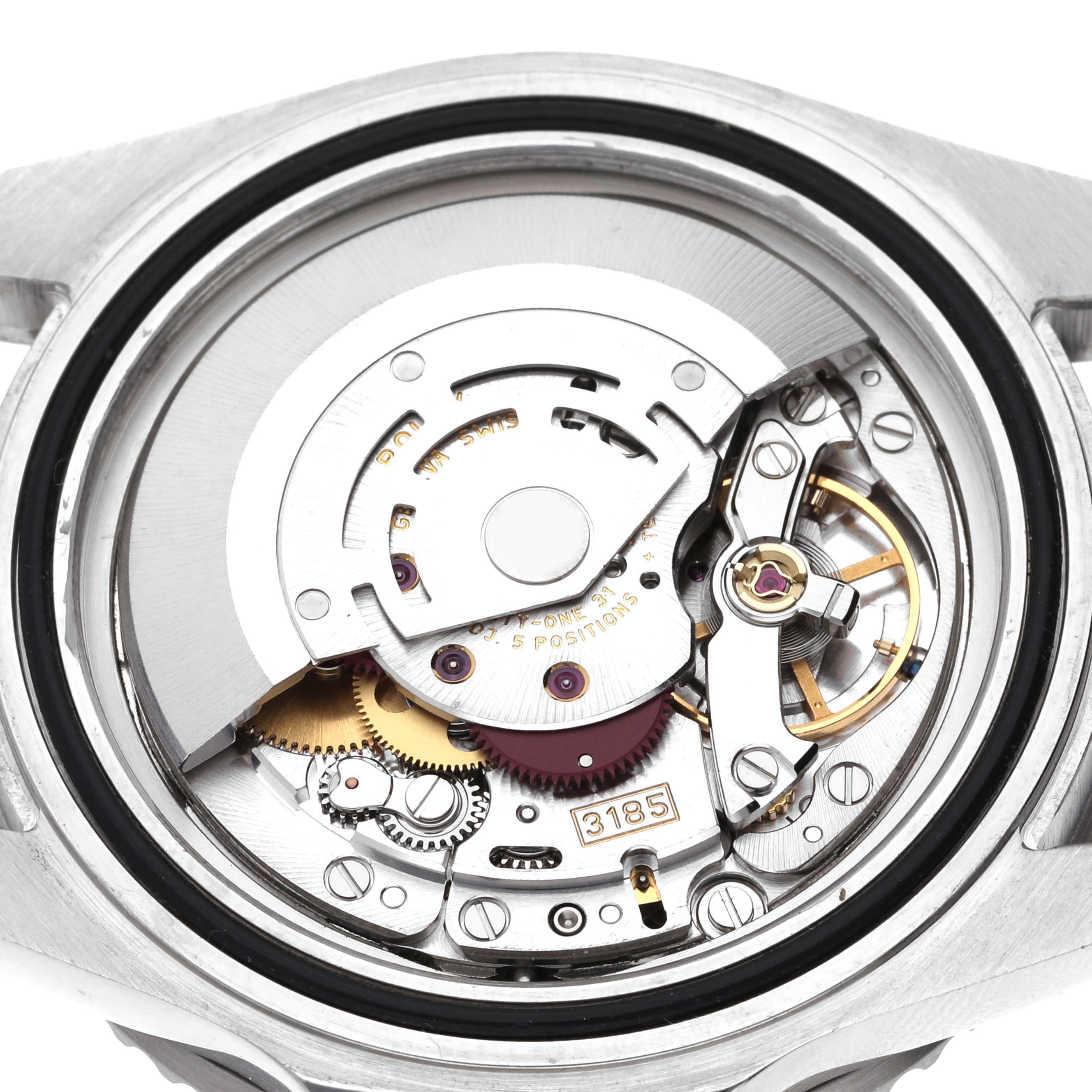 This image shows the internal mechanical movement of a Rolex GMT-Master 16710 Men
s Stainless Steel Black Dial 16710 Men
s Stainless Steel Black Dial watch, specifically the caliber 3185, viewed from the back.