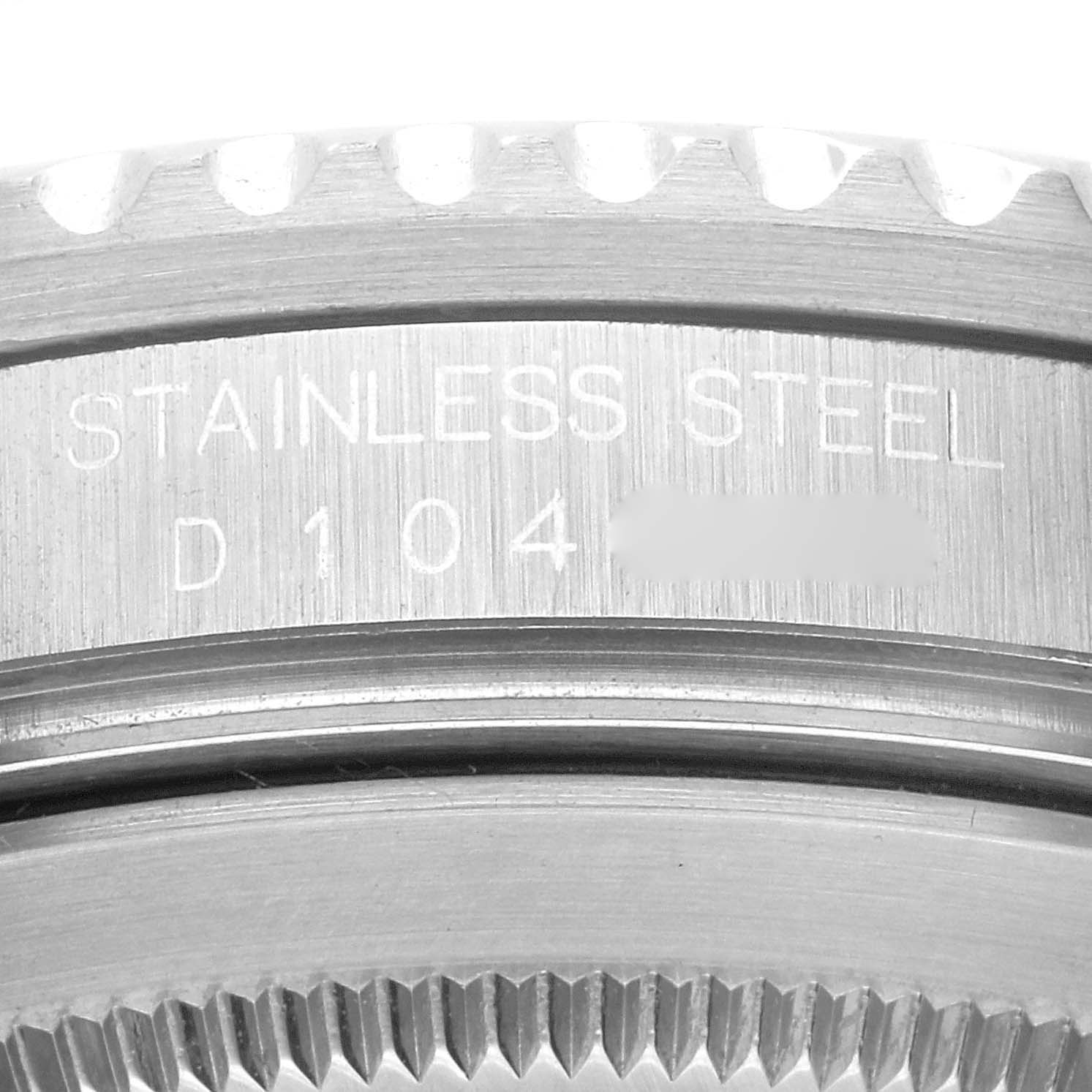 The image shows a close-up of the stainless steel case and bezel of a Rolex GMT-Master 16710 Men
s Stainless Steel Black Dial 16710 Men
s Stainless Steel Black Dial watch.