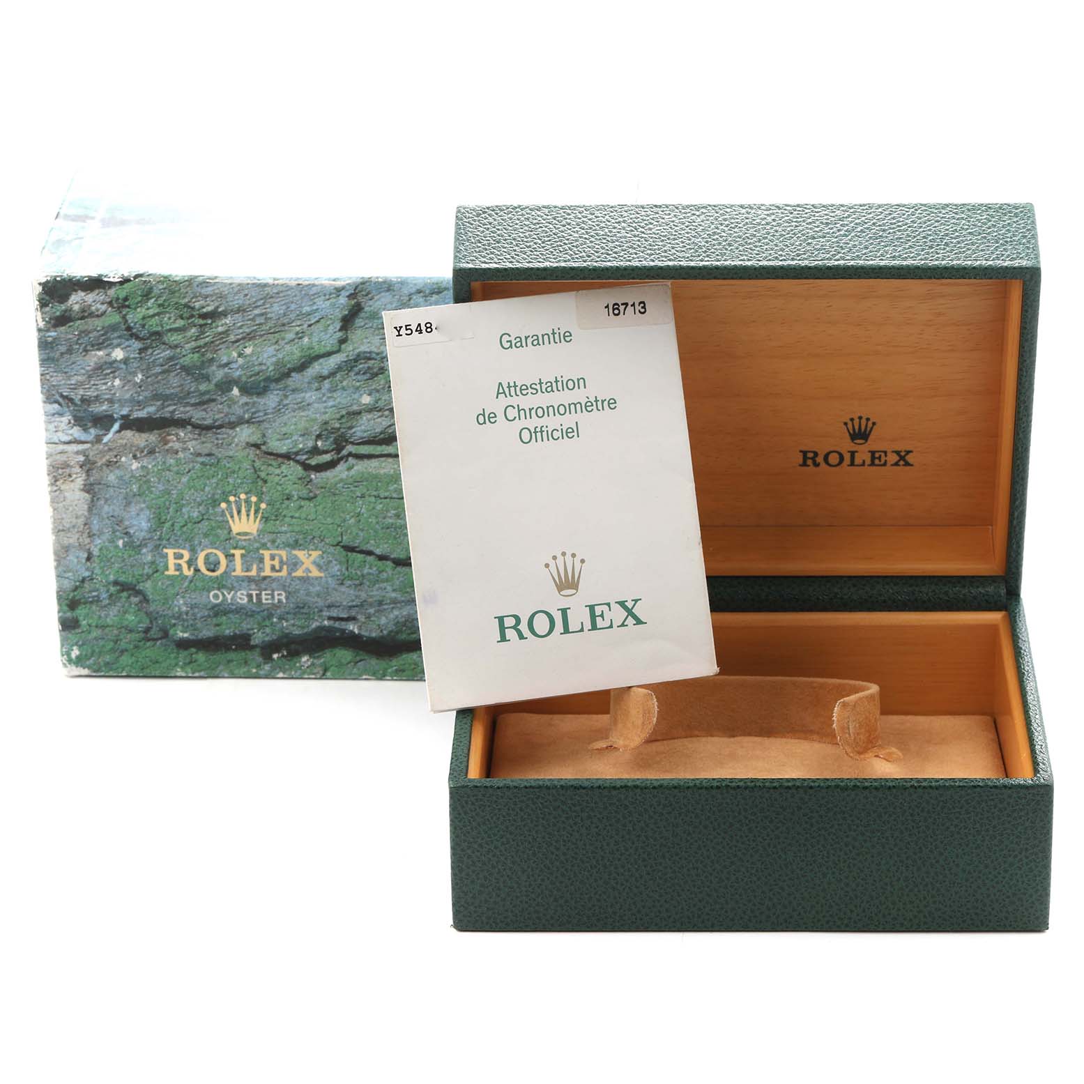 The image shows a Rolex GMT-Master 16713 Men
s Steel and Gold (two tone) Black Dial 16713 Men
s Steel and Gold (two tone) Black Dial watch box and accessories, including a warranty card, at an angled view.