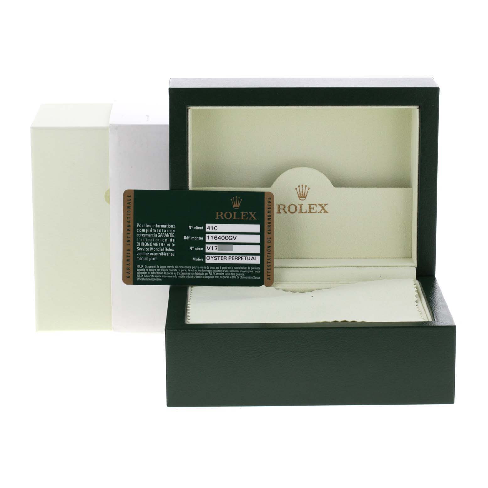 The image shows the packaging and warranty card for a Rolex Milgauss 116400V Men
s Stainless Steel Black Dial 116400V Men
s Stainless Steel Black Dial watch model.