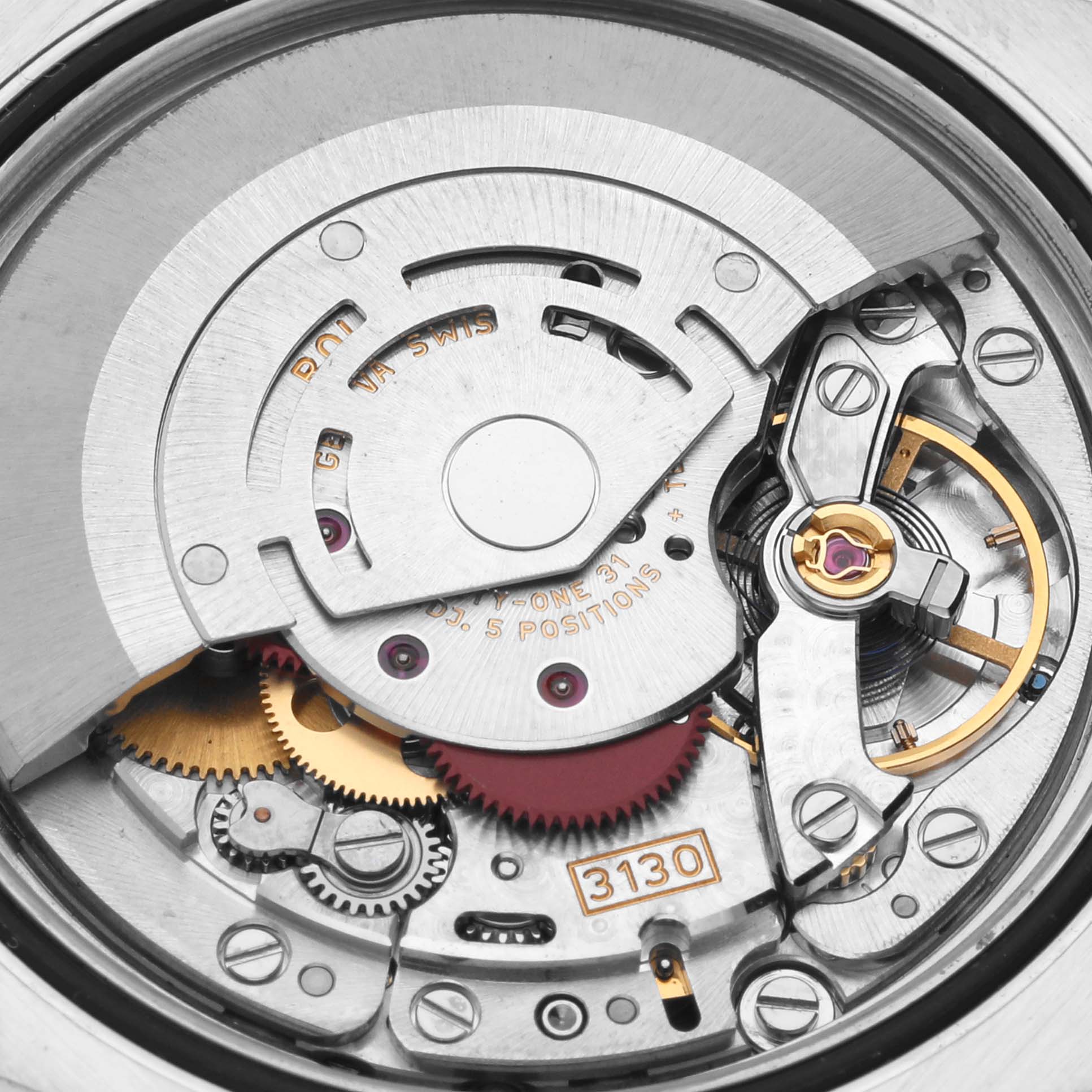 The image shows a close-up of the Rolex Oyster Perpetual 116000 Men
s Stainless Steel Blue Dial 116000 Men
s Stainless Steel Blue Dial 3130 caliber movement showcasing its intricate internal mechanism.