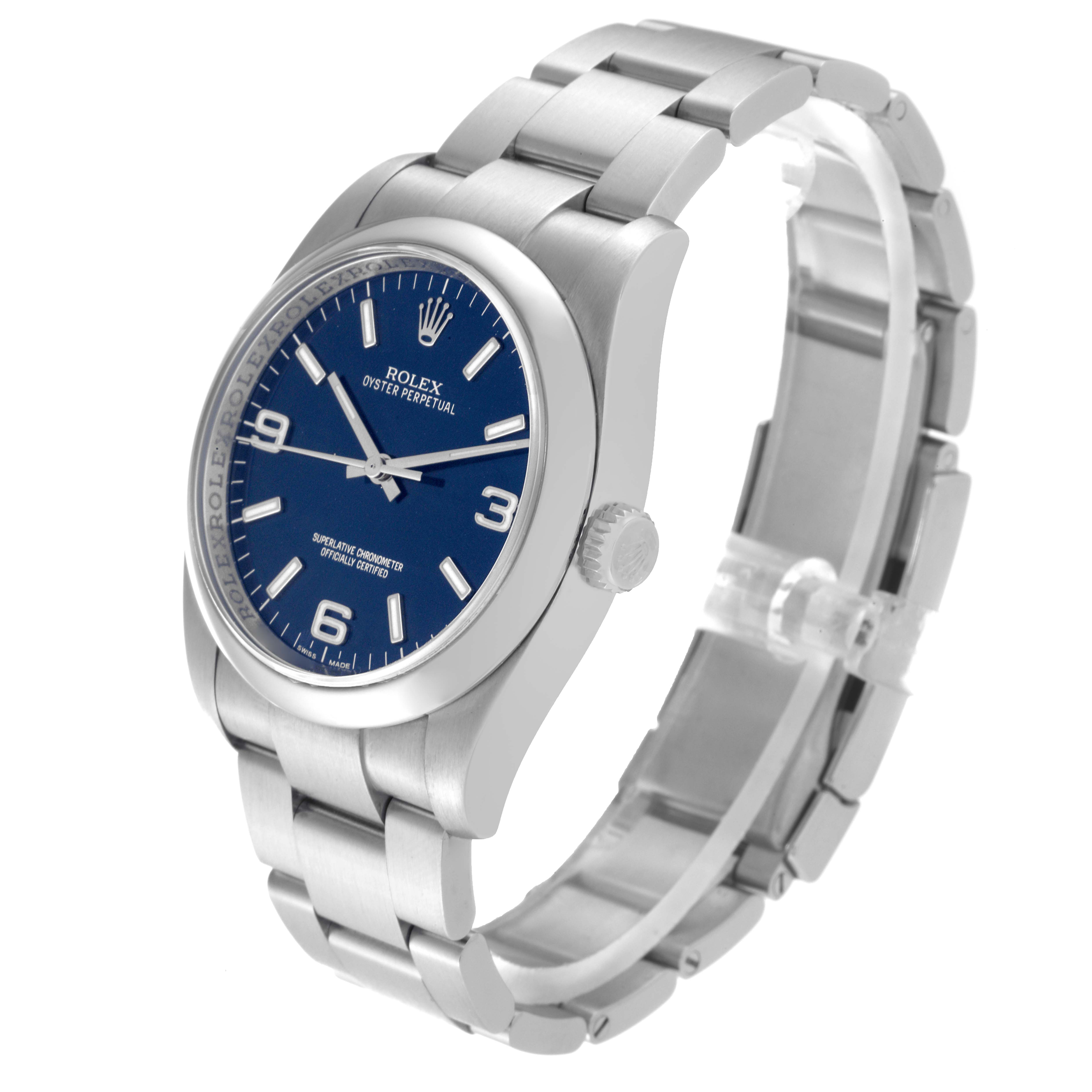The image shows a Rolex Oyster Perpetual 116000 Men
s Stainless Steel Blue Dial 116000 Men
s Stainless Steel Blue Dial watch at a slight angle, highlighting the face, crown, and metal bracelet.