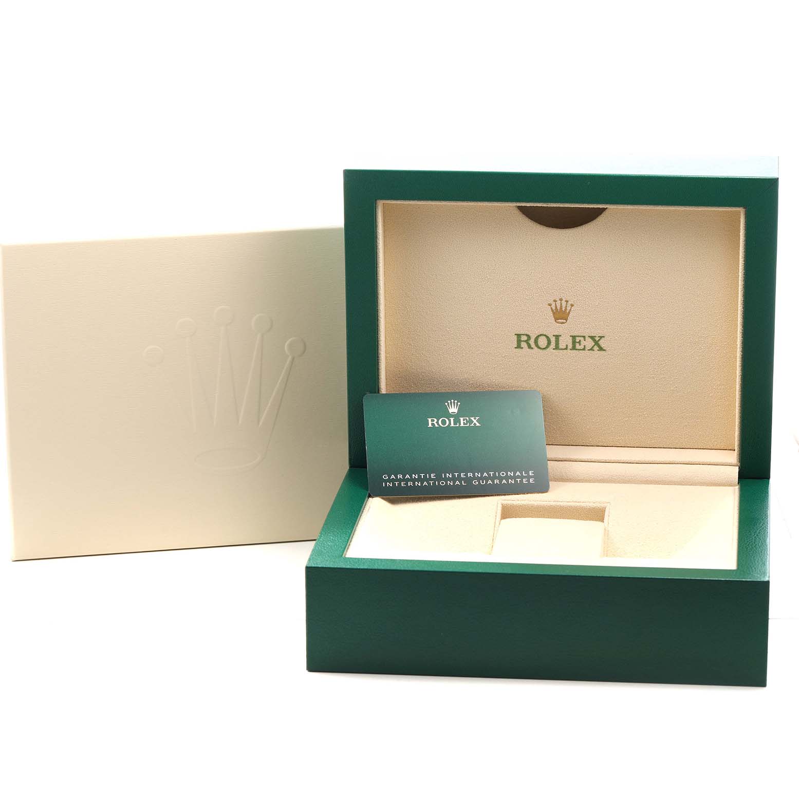 The image shows a Rolex Oyster Perpetual 124300 Men's Stainless Steel Blue Dial box and guarantee card from a frontal angle, displaying the interior and watch holder.