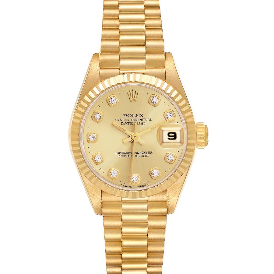 The Rolex President model watch is shown from a top-down angle, displaying the full face, bezel, and bracelet.
