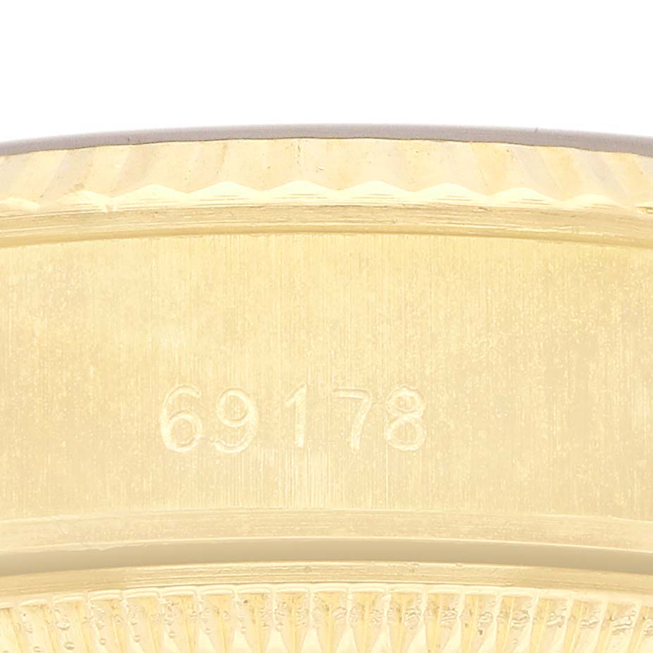 The image shows the side of a Rolex Datejust 69178 Women's Yellow Gold Champagne Dial watch with model number "69178" engraved on the gold case.