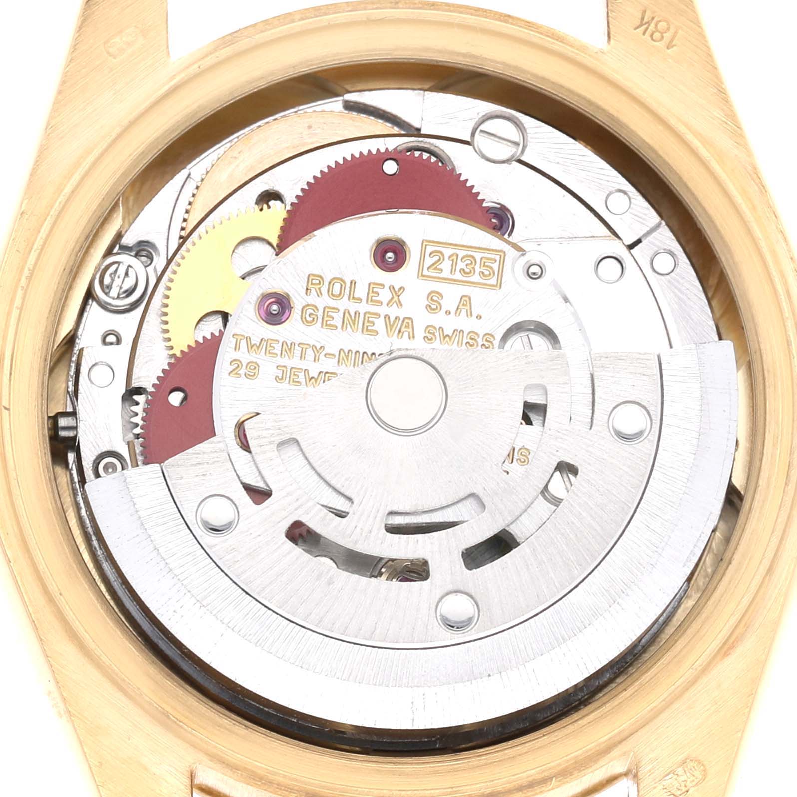 The image shows the movement of a Rolex Datejust 69178 Women's Yellow Gold Champagne Dial watch from the back, highlighting gears and the rotor.