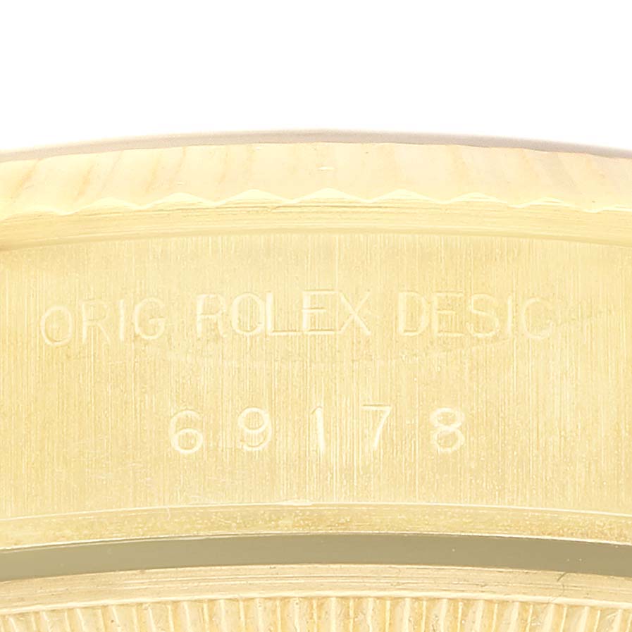 The image shows a close-up of the side engraving on the bezel of a Rolex President 69178 Women's Yellow Gold Champagne Dial model, displaying the model number "69178".