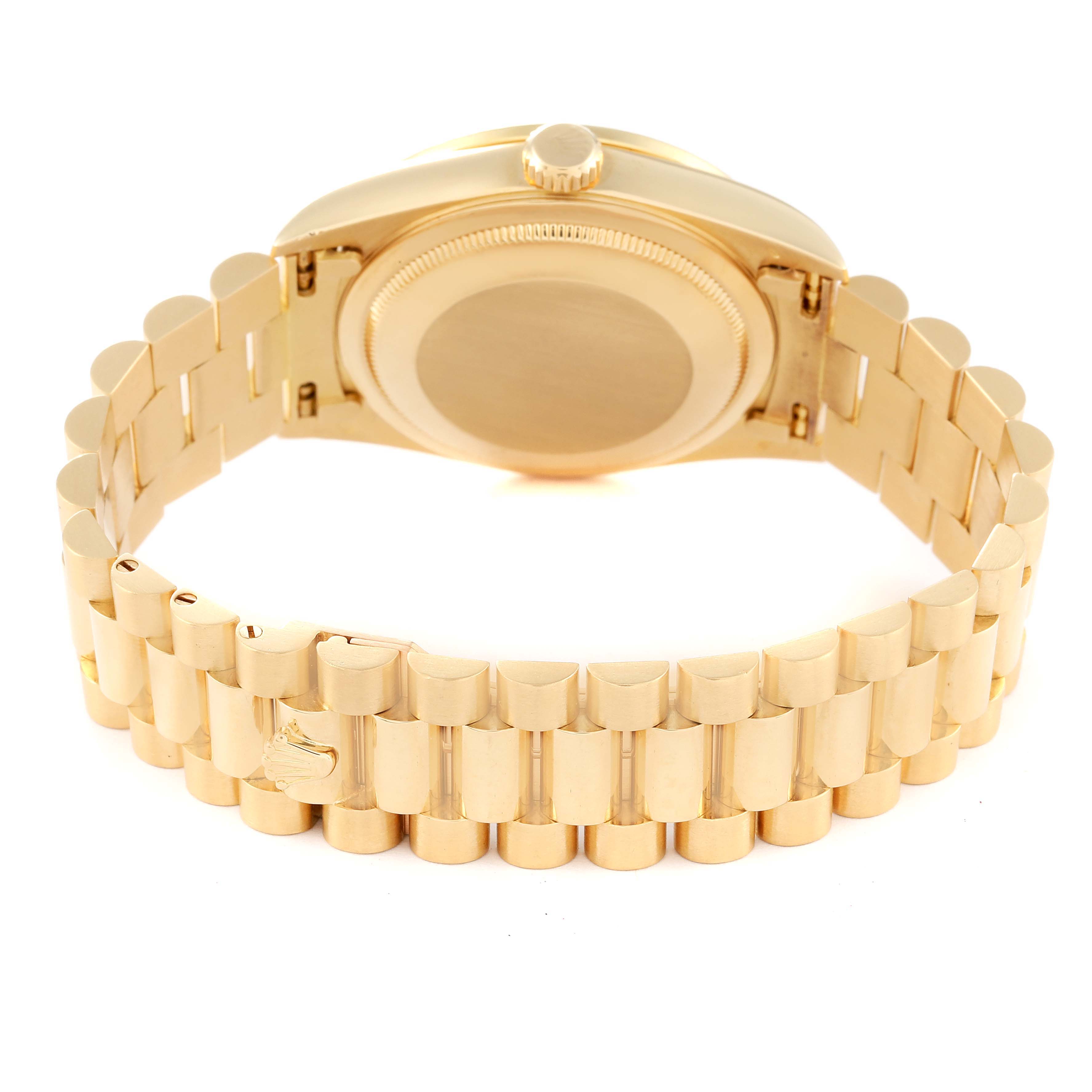The image shows the backside and bracelet of a Rolex President 18388 Men
s Yellow Gold Champagne Dial 18388 Men
s Yellow Gold Champagne Dial model watch, highlighting its gold links and case.