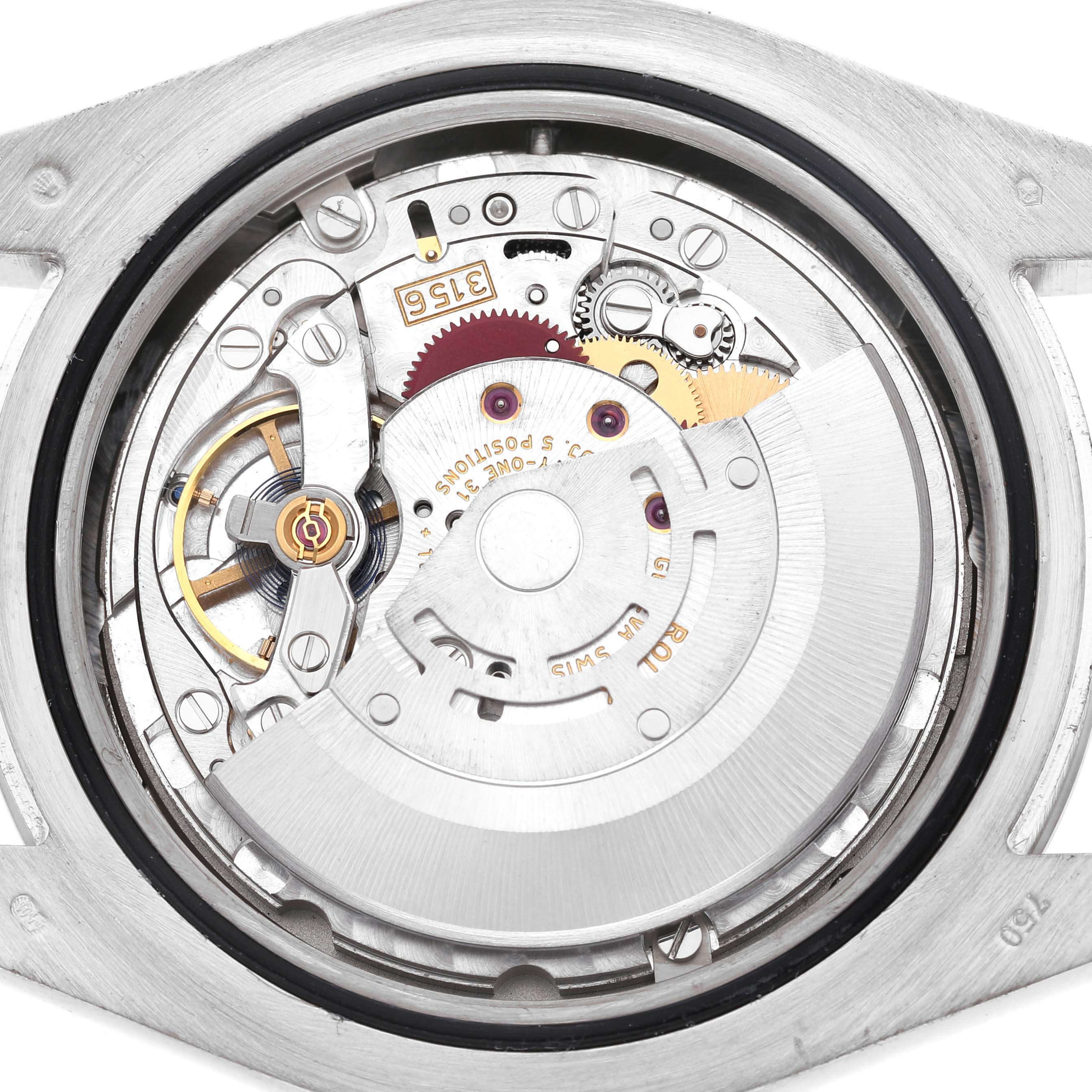 The image shows the internal movement mechanism of a Rolex President 218239 Men's White Gold Silver Dial watch from a top-down angle.