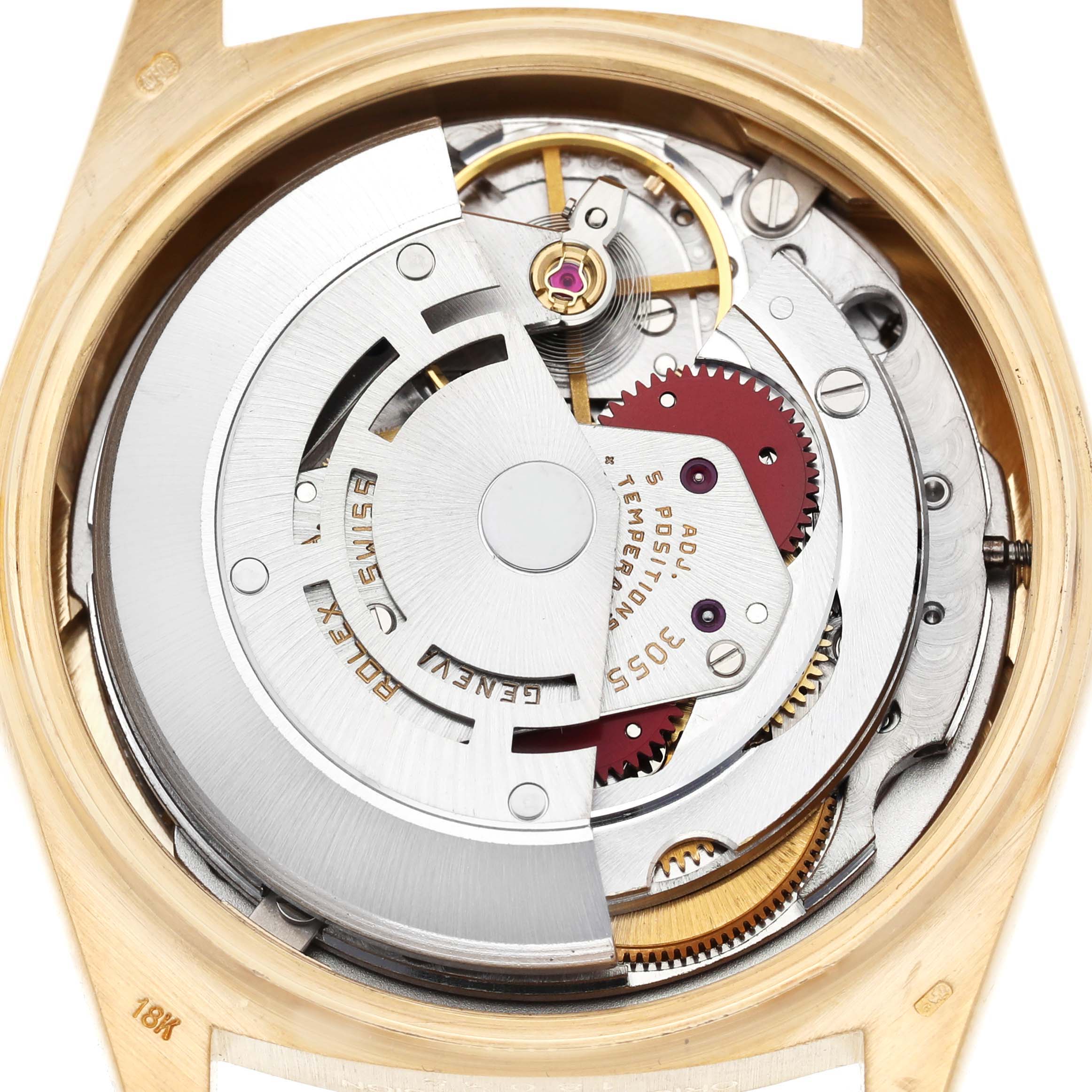 The image shows the internal movement mechanism of a Rolex President 18038 Men's Yellow Gold Champagne Dial watch from the back, highlighting its intricate components.