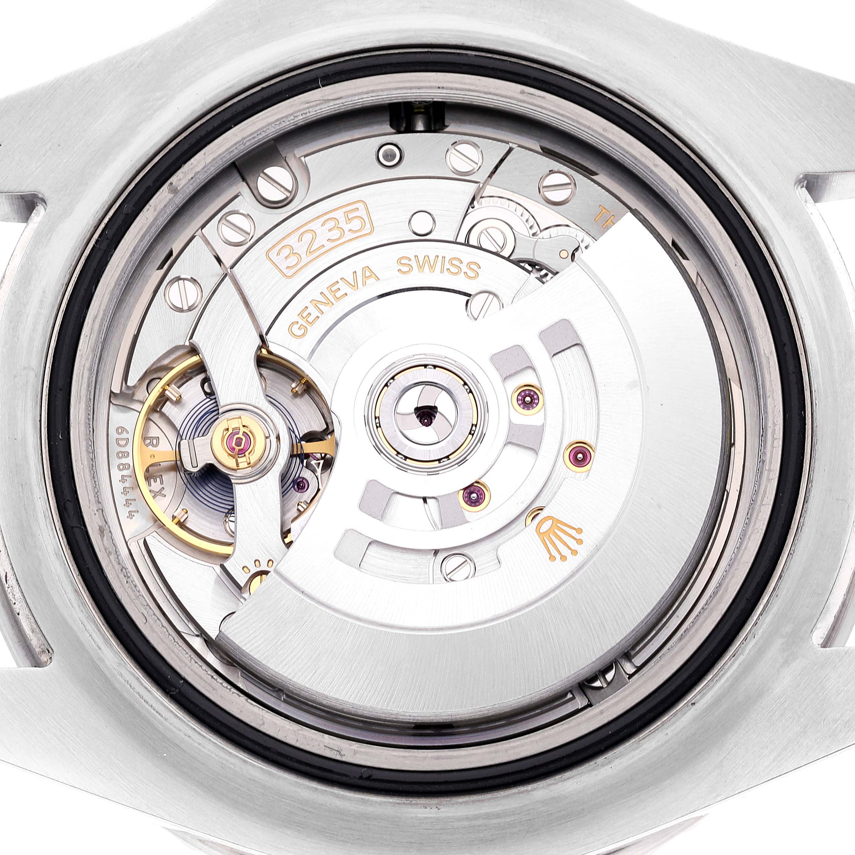 This is a close-up view of the movement inside a Rolex Sea-Dweller 126600 Men
s Stainless Steel Black Dial 126600 Men
s Stainless Steel Black Dial watch, showing intricate gears and components.