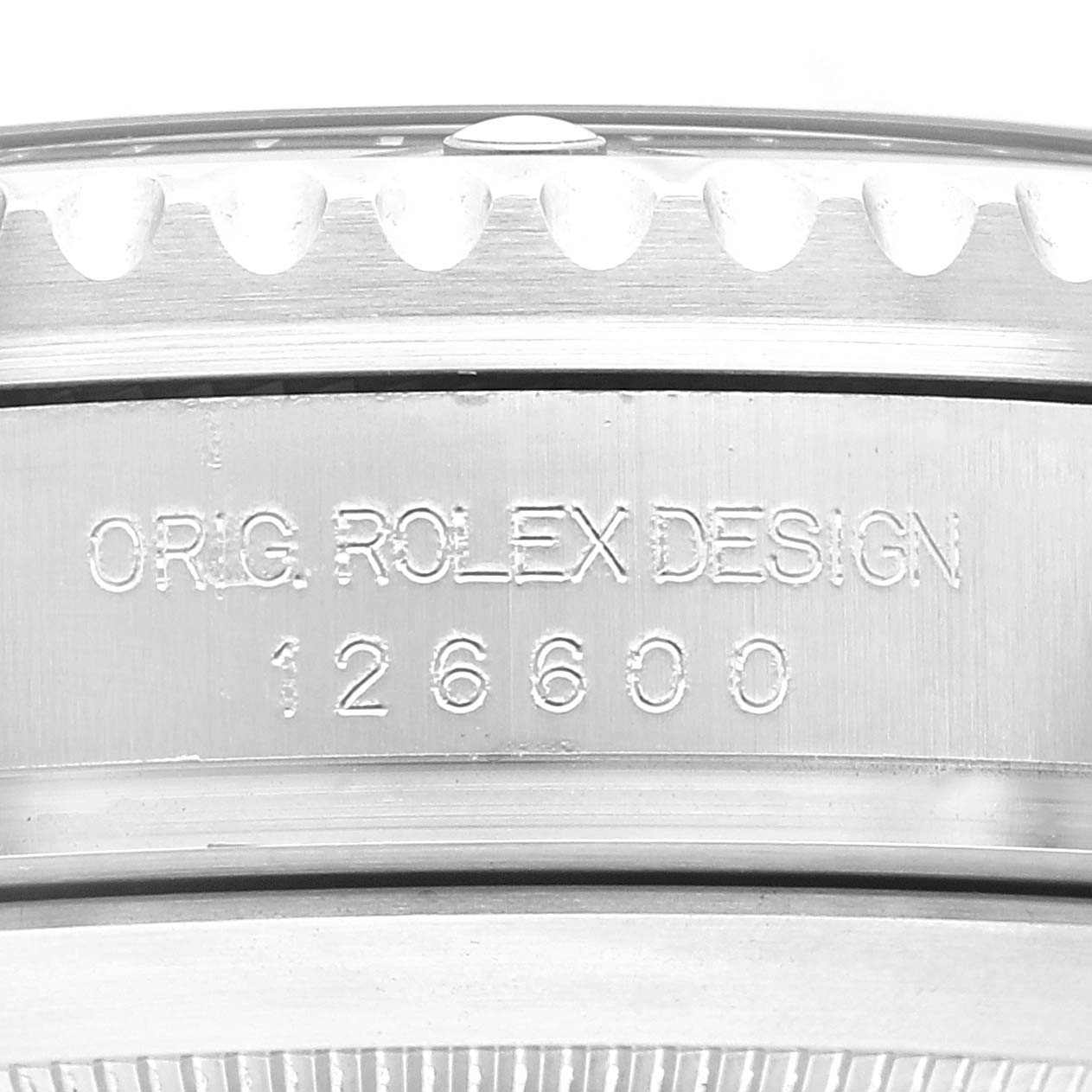 This image shows a close-up view of the case back of a Rolex Sea-Dweller 126600 Men
s Stainless Steel Black Dial 126600 Men
s Stainless Steel Black Dial model, highlighting the engraved model number "126600."