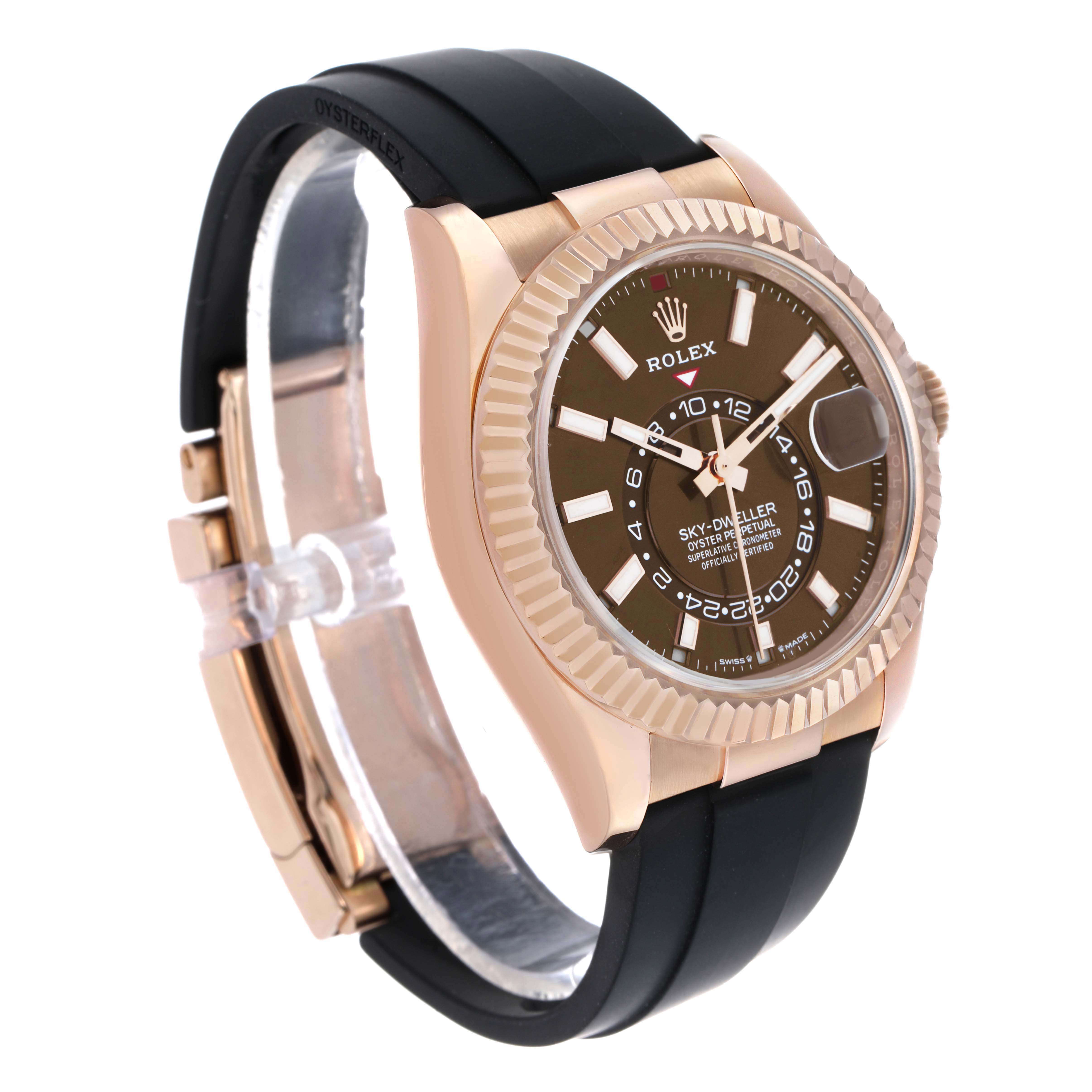 The Rolex Sky-Dweller 336235 Men's Rose Gold Brown Dial is shown at a side angle, displaying the watch face, bezel, and black strap.
