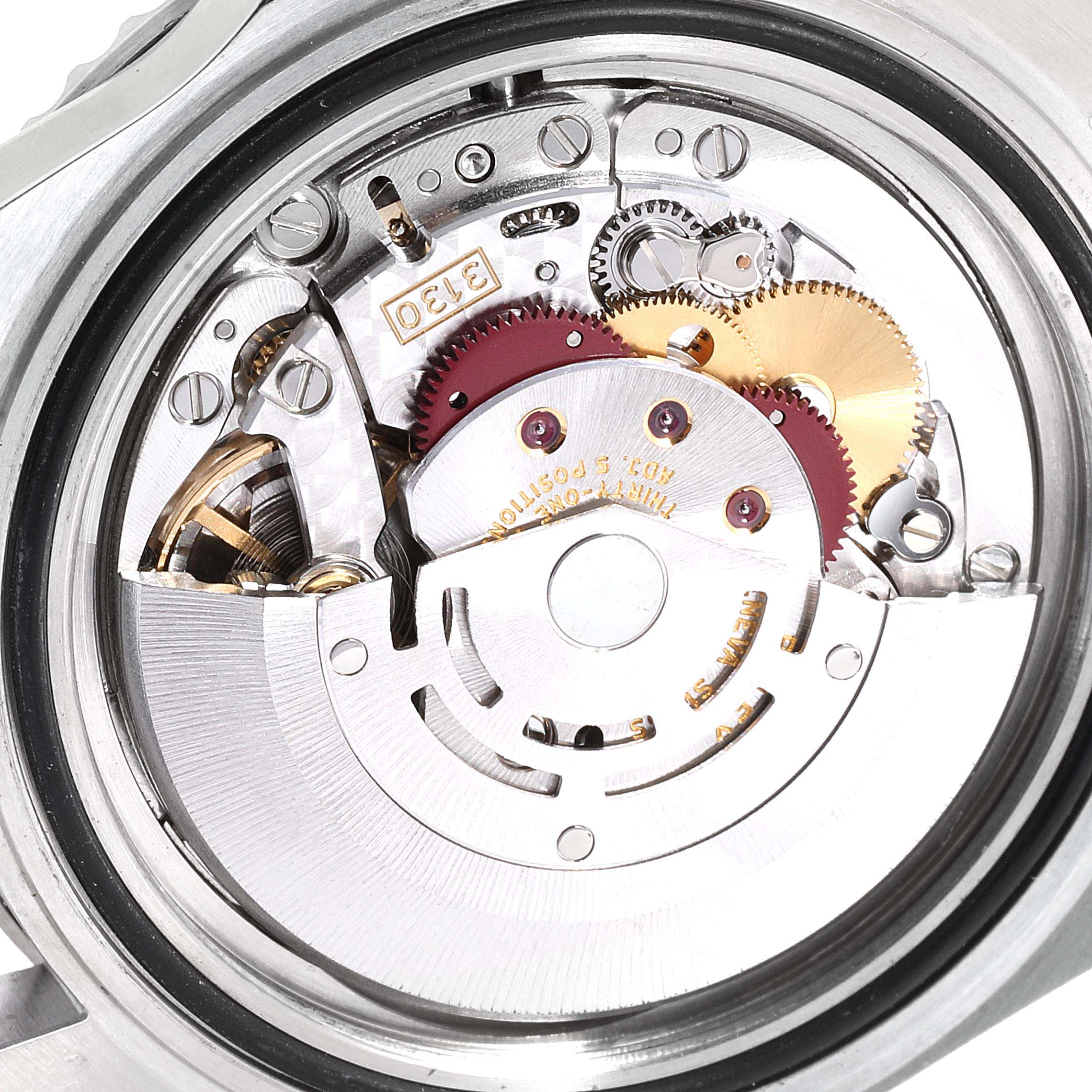 This is a close-up view of the internal mechanism of the Rolex Submariner 14060M Men
s Stainless Steel Black Dial 14060M Men
s Stainless Steel Black Dial watch, showcasing its intricate gears and components.