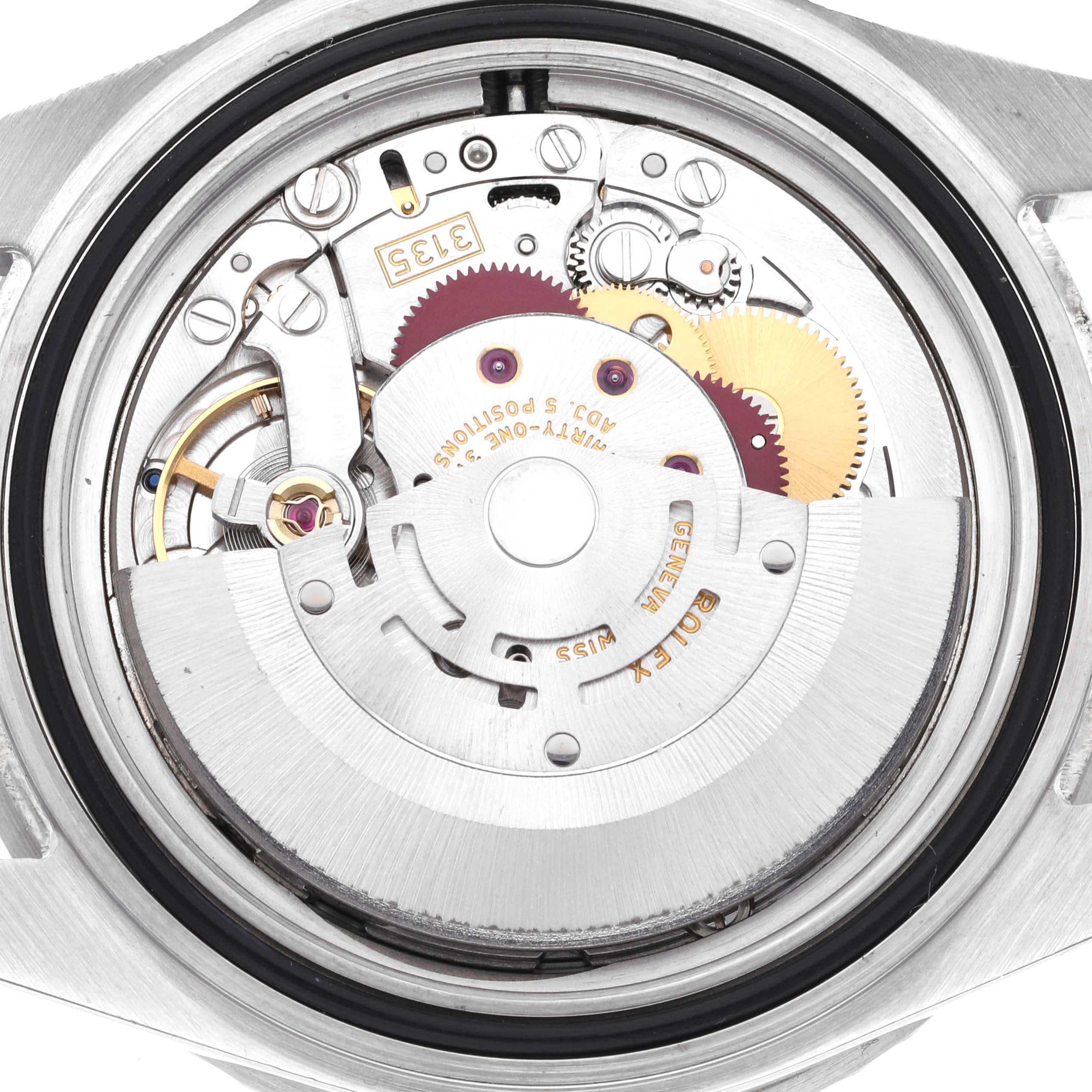 This image shows the rear view of the Rolex Submariner 16610 Men
s Stainless Steel Black Dial 16610 Men
s Stainless Steel Black Dial
s movement, including gears and internal mechanisms.