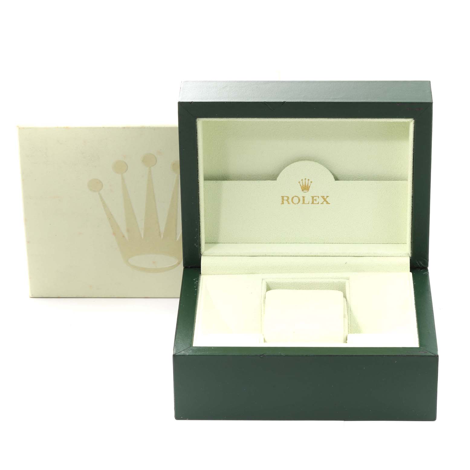 The image shows an open green Rolex Submariner 16610 Men
s Stainless Steel Black Dial 16610 Men
s Stainless Steel Black Dial watch box with the logo and cushioning inside for the watch.