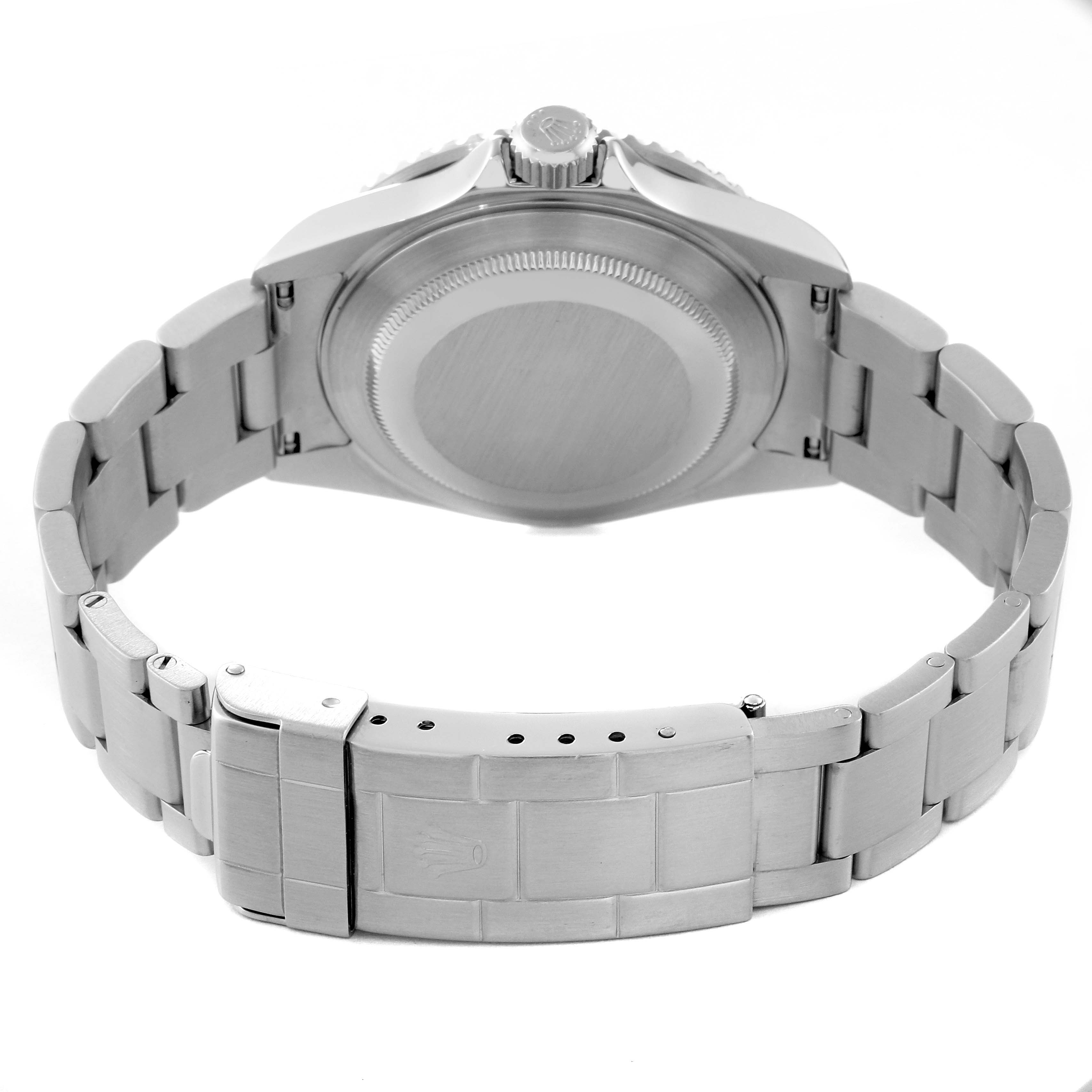 This image shows the back case and bracelet of a Rolex Submariner 16610 Men
s Stainless Steel Black Dial 16610 Men
s Stainless Steel Black Dial watch from a rear angle.