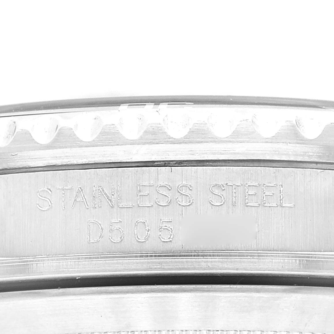 This close-up image shows the side view of the stainless steel case with engravings on a Rolex Submariner 16610 Men
s Stainless Steel Black Dial 16610 Men
s Stainless Steel Black Dial watch.