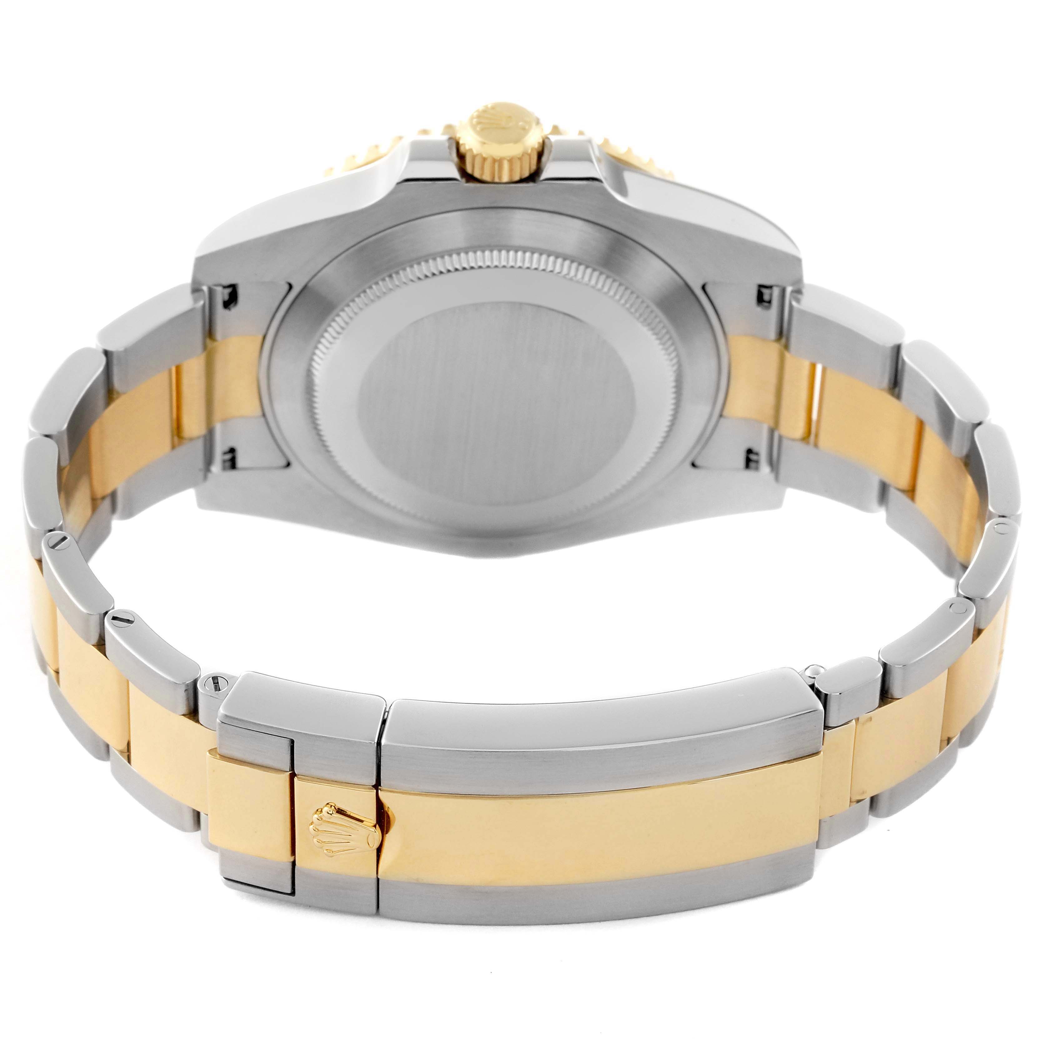 This image shows the back view of the Rolex Submariner 116613LB Men's Steel and Gold (two tone) Blue Dial 116613LB Men's Steel and Gold (two tone) Blue Dial watch, highlighting the case back, crown, and two-tone bracelet.