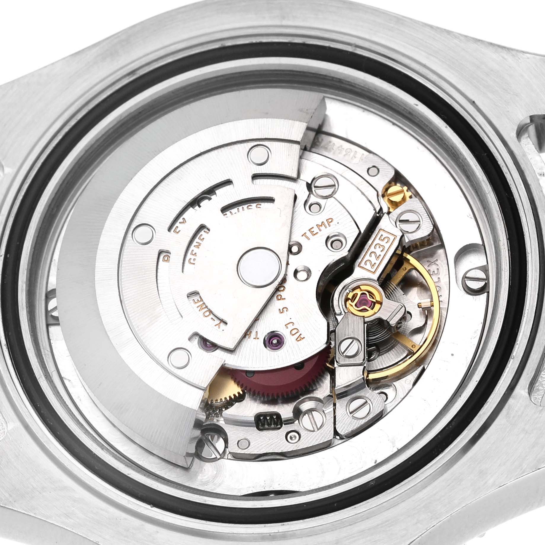 The image shows the movement of a Rolex Yacht-Master 168623 Men's Steel and Gold (two tone) Champagne Dial watch from a rear angle, highlighting its intricate mechanical parts.