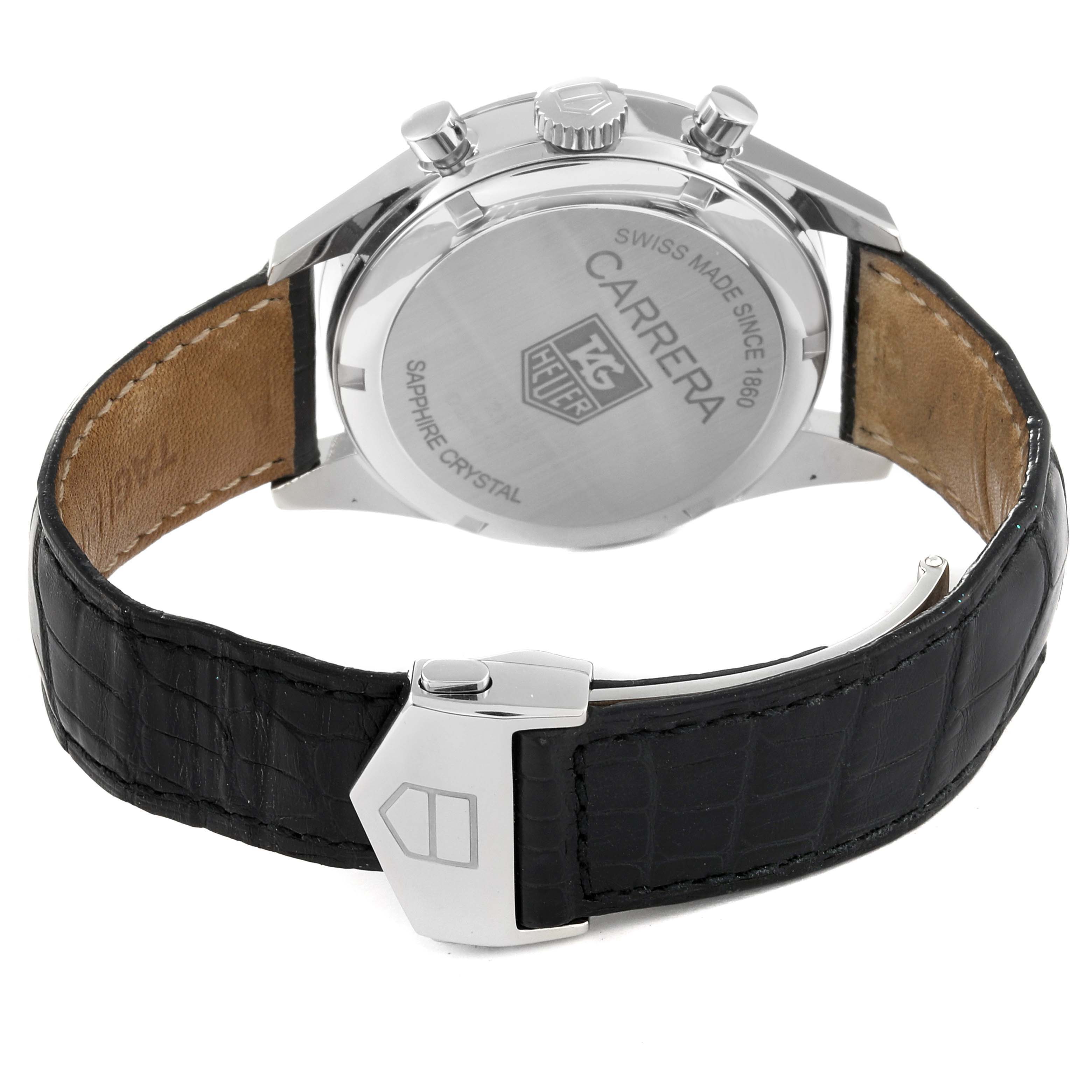 This image shows the back view of a Tag Heuer Carrera CV2115 Men's Stainless Steel Mother of Pearl Dial CV2115 Men's Stainless Steel Mother of Pearl Dial watch with its clasp and leather strap visible.
