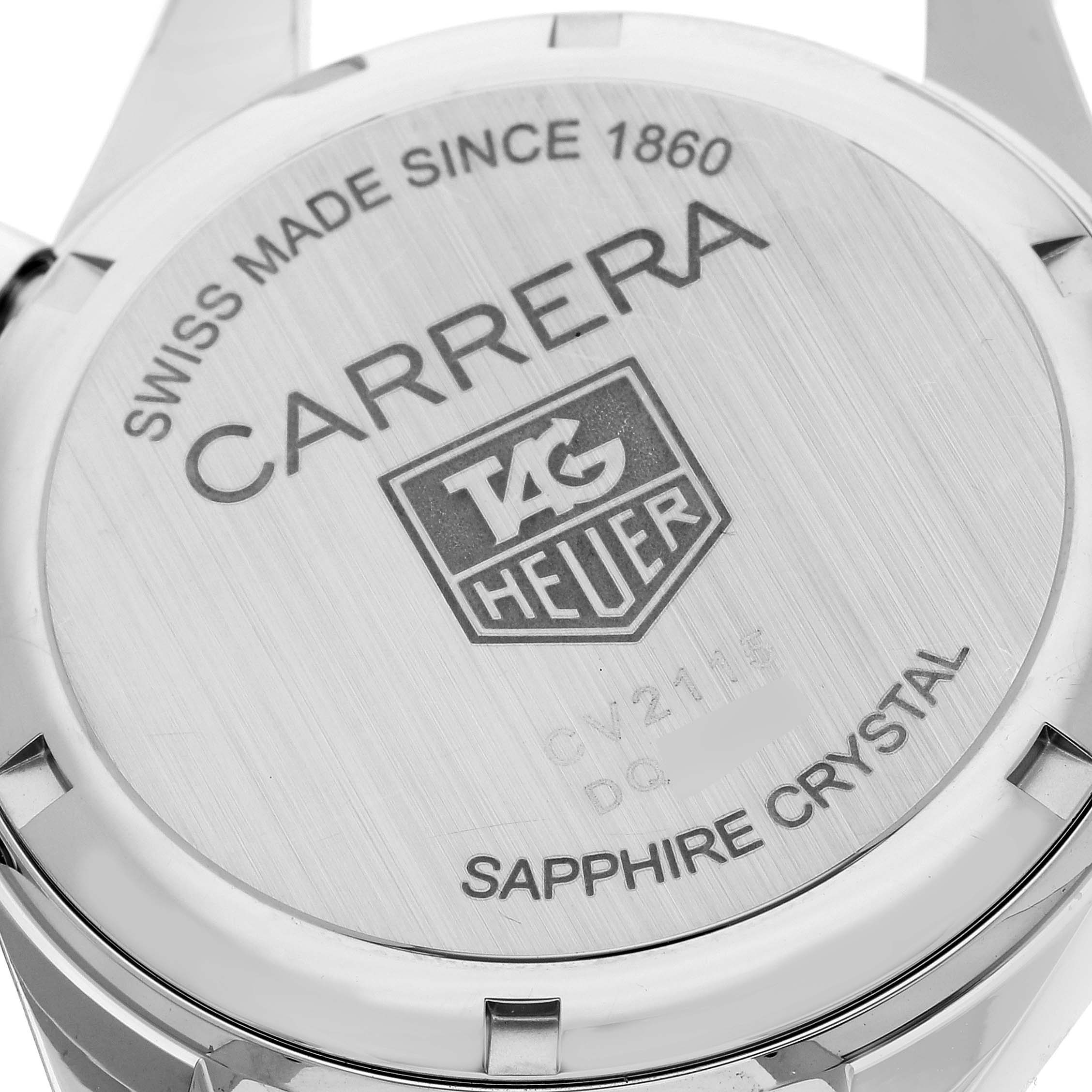 The image shows the case back of a Tag Heuer Carrera CV2115 Men's Stainless Steel Mother of Pearl Dial CV2115 Men's Stainless Steel Mother of Pearl Dial watch, highlighting text details and brand engraving.