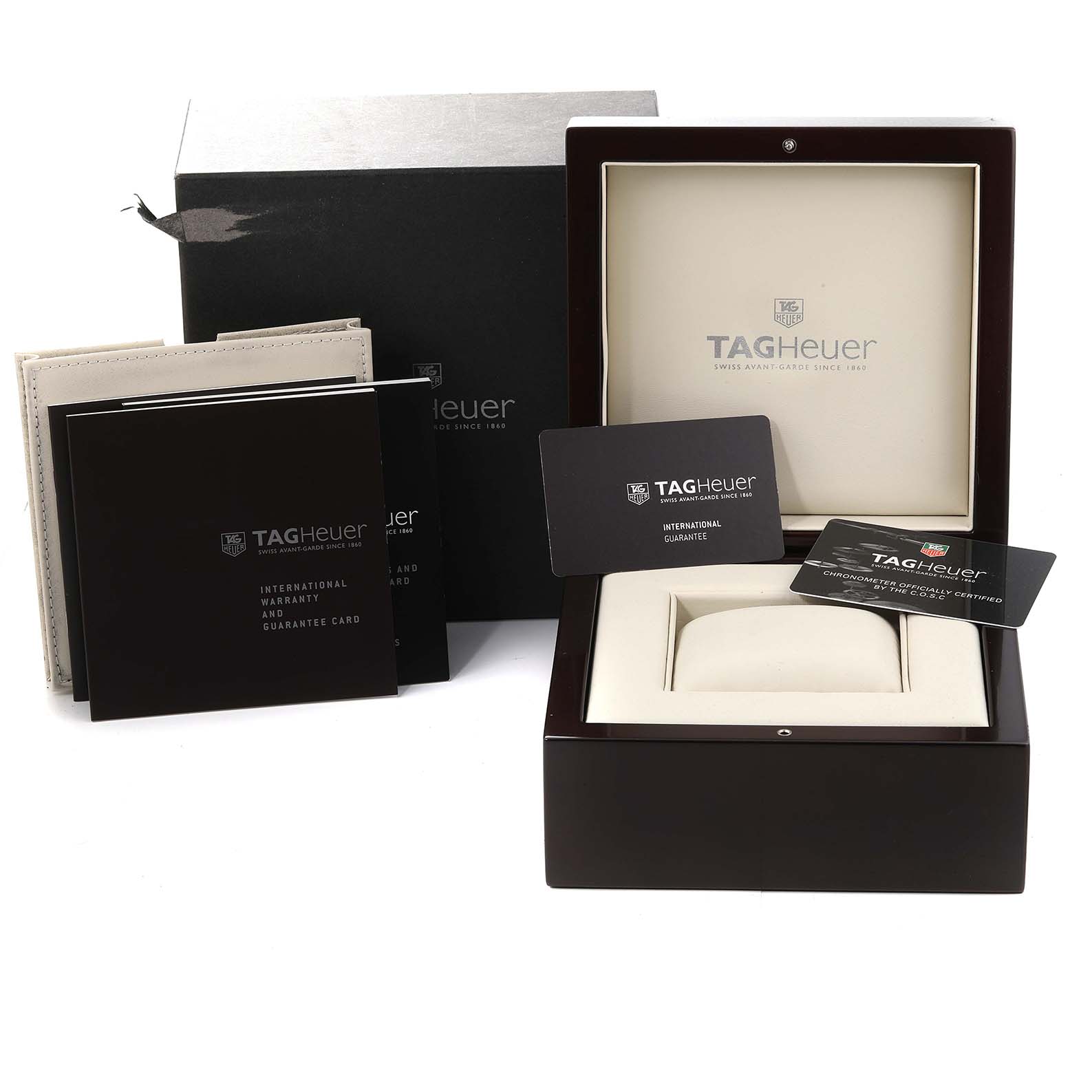 The image shows the packaging and accessories for a Tag Heuer Carrera CAV511A.FC6225 Men's Stainless Steel Black Dial CAV511A.FC6225 Men's Stainless Steel Black Dial watch, including the box, warranty card, and user manuals.